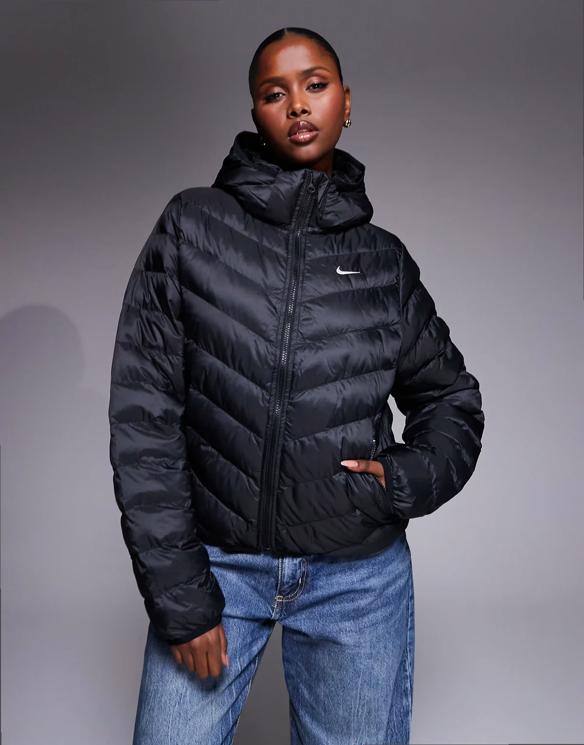 Sportswear puffer jacket in black