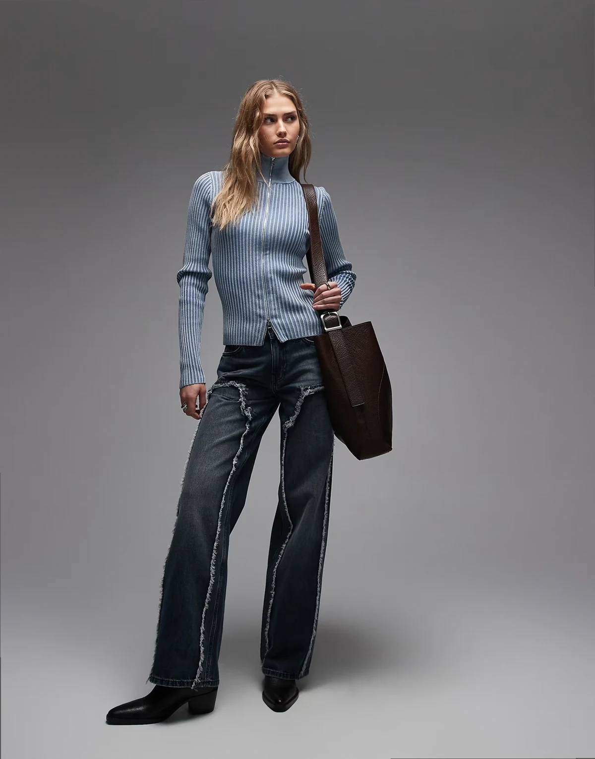 ample low waist baggy fit jeans with frayed detailing in dark blue wash