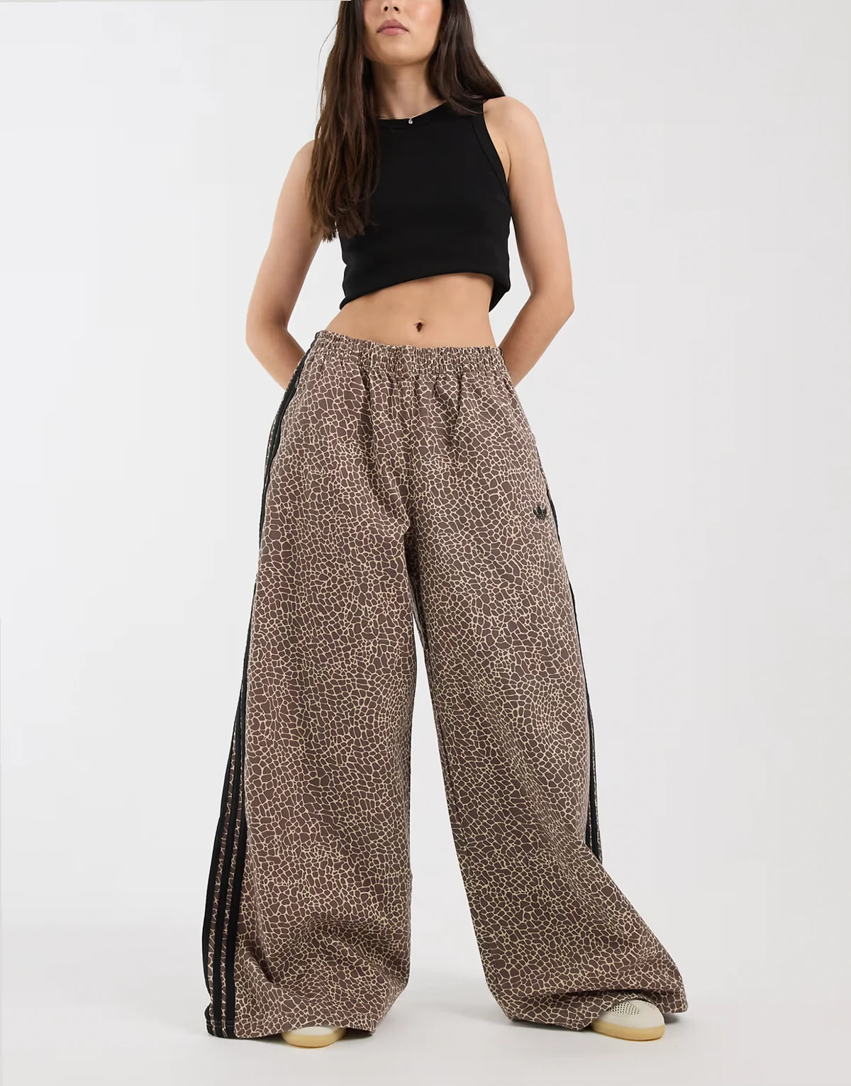 Firebird denim track pants in brown animal print