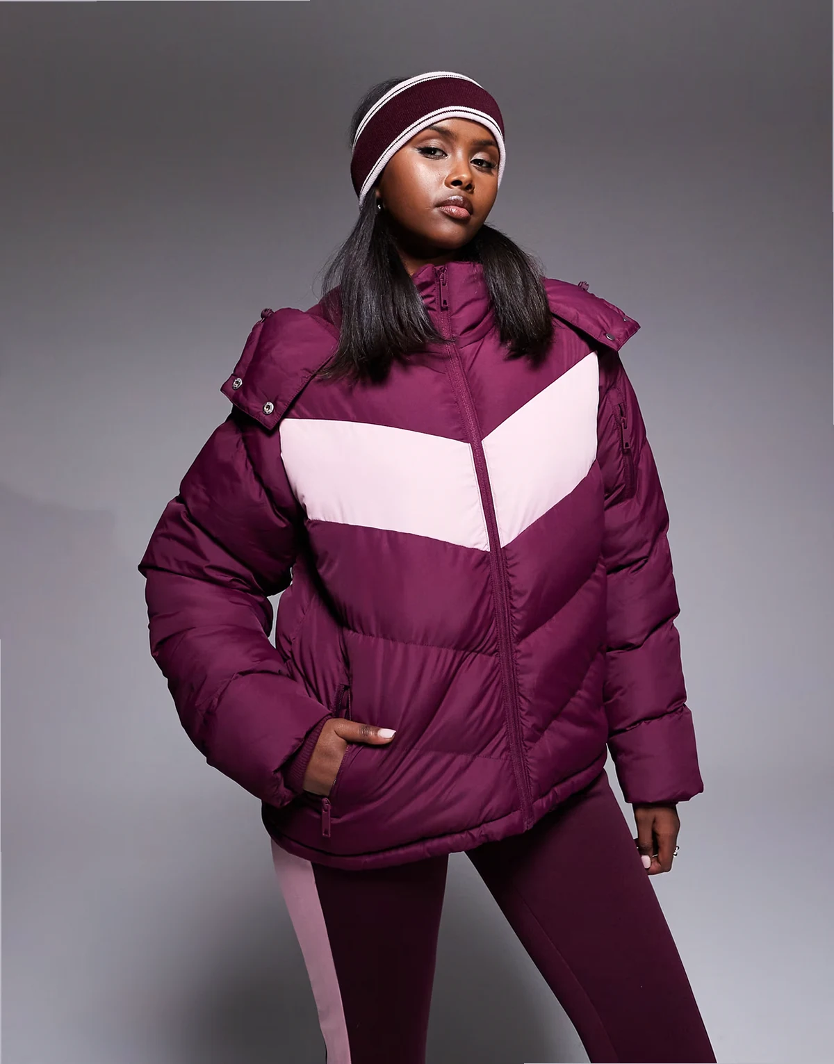 Ski puffer jacket with pink panel contrast in burgundy