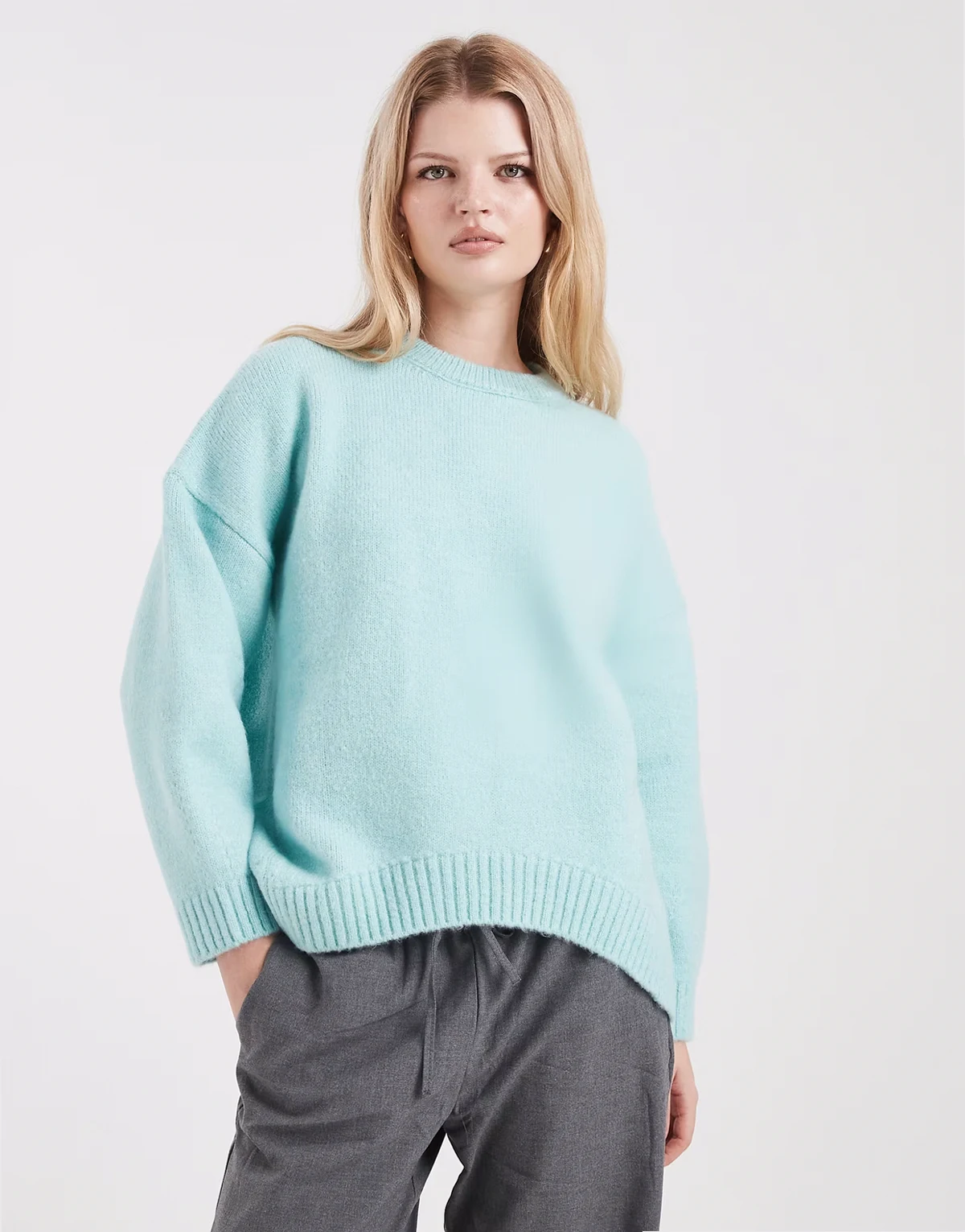oversized crew neck sweater with curved hem in duck egg blue