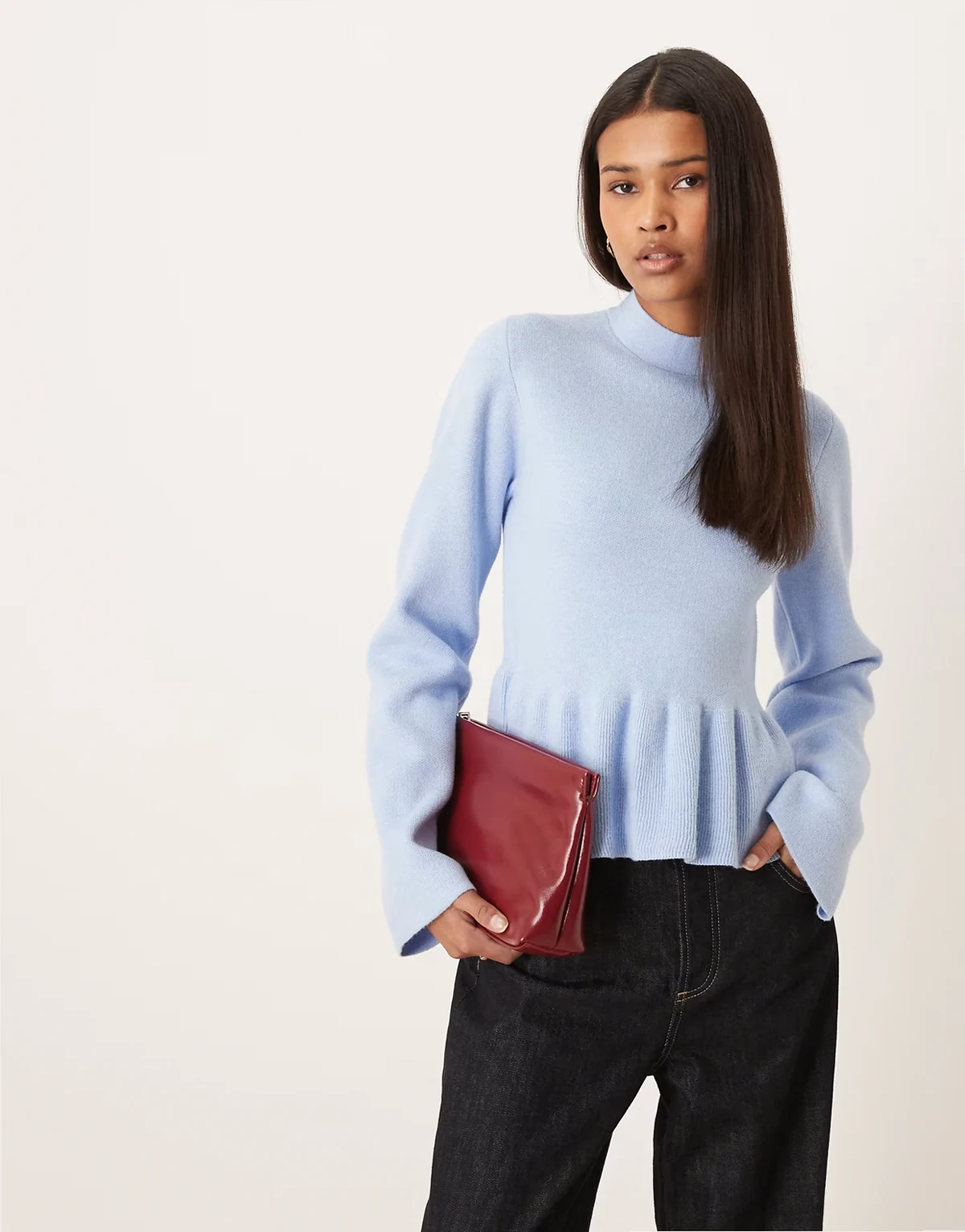 – Gestricktes Schößchenoberteil in Hellblau