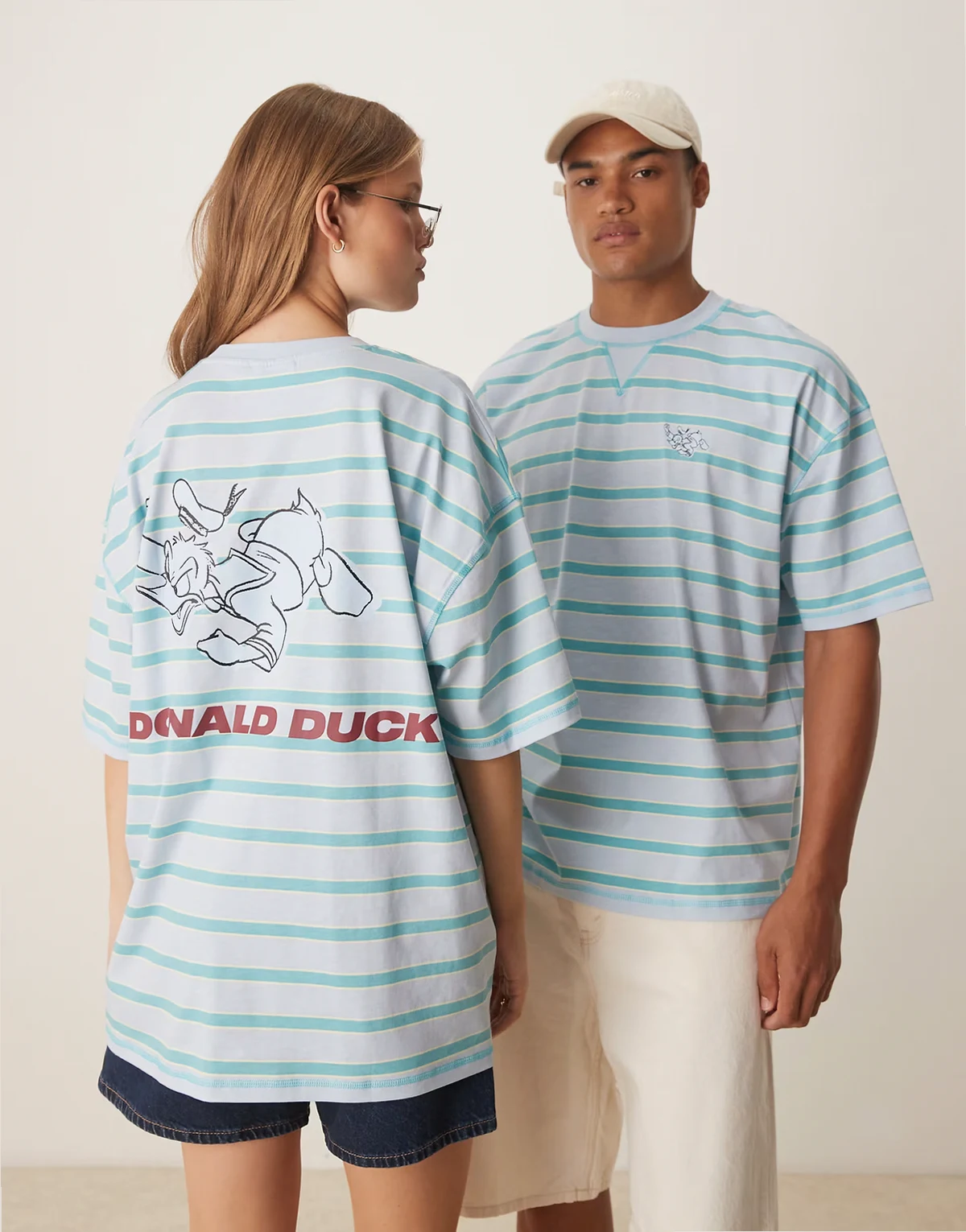 Disney – Niebieski T-shirt oversize w paski z nadrukiem Kaczora Donalda