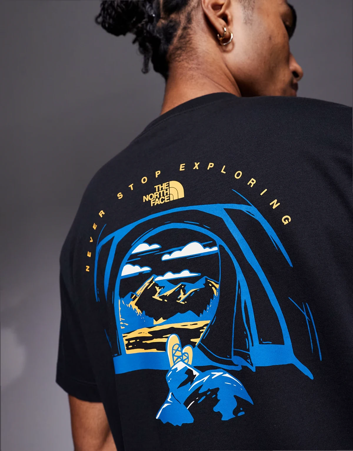 Evolution tent back print T-shirt in black