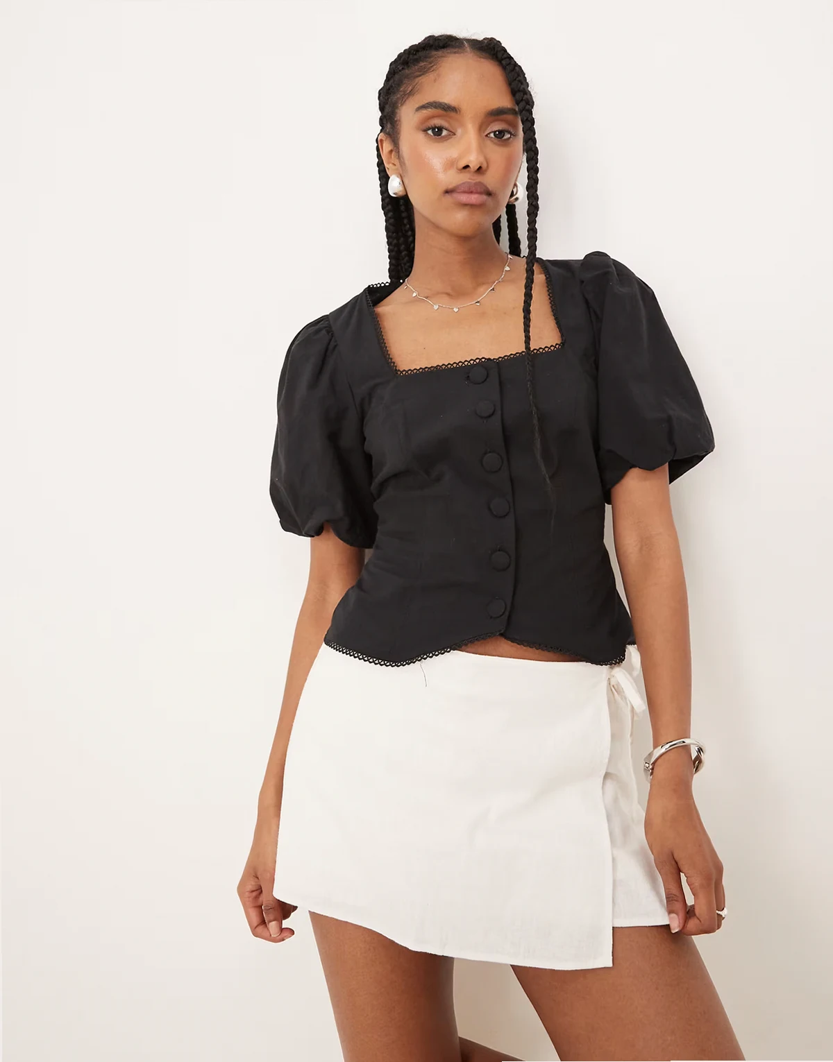 puff sleeve button down top in black