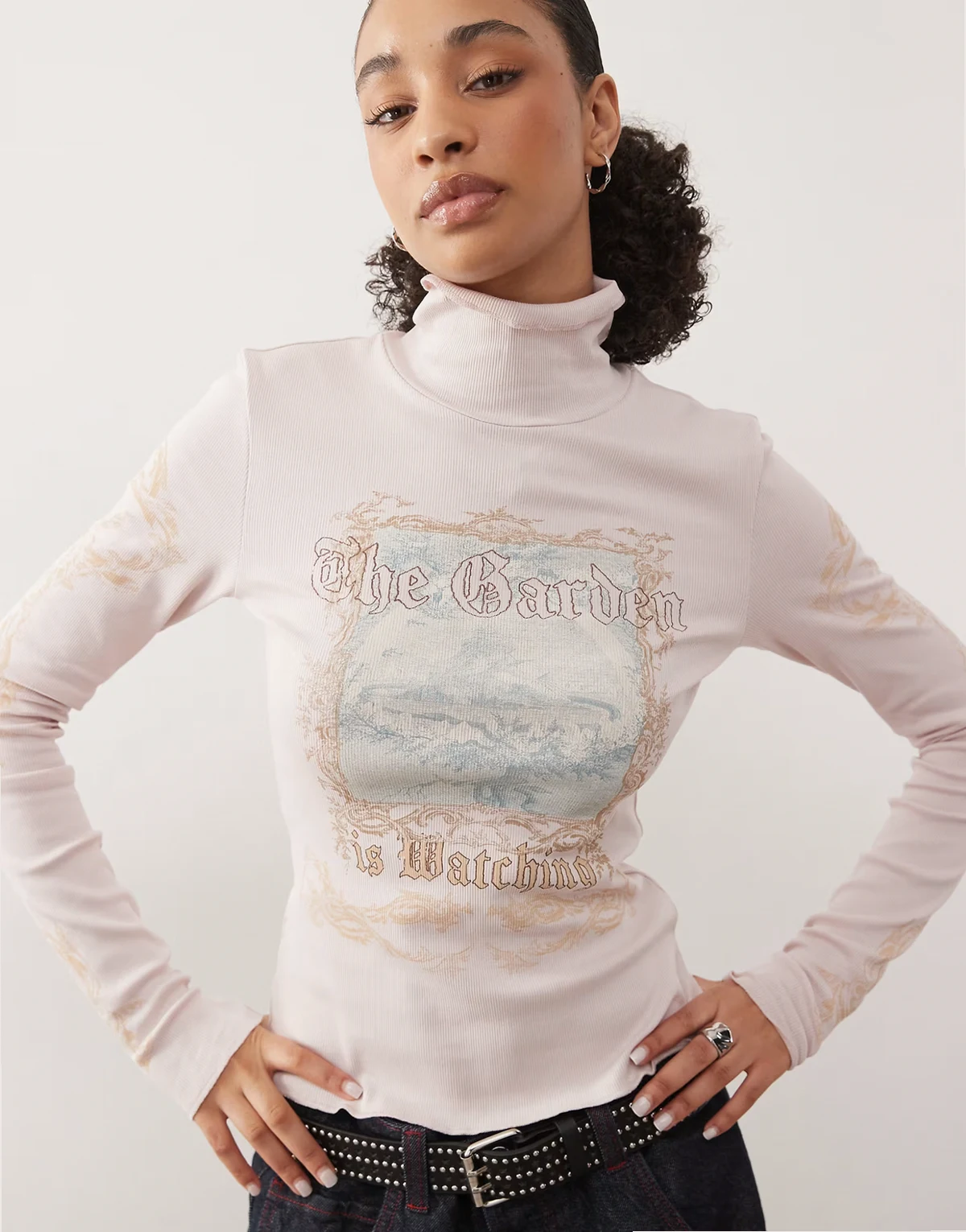 graphic print turtleneck long sleeve top in pink