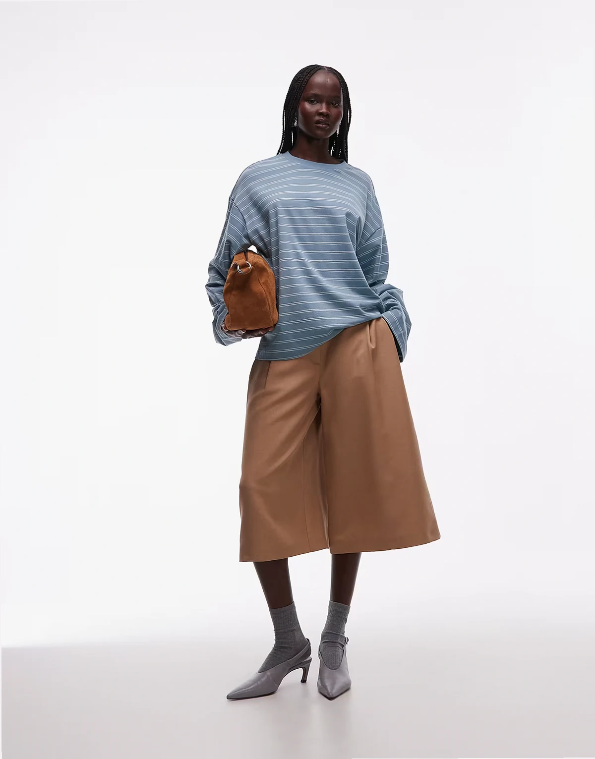 oversized long sleeve T-shirt with side slits in two tone turquoise stripe