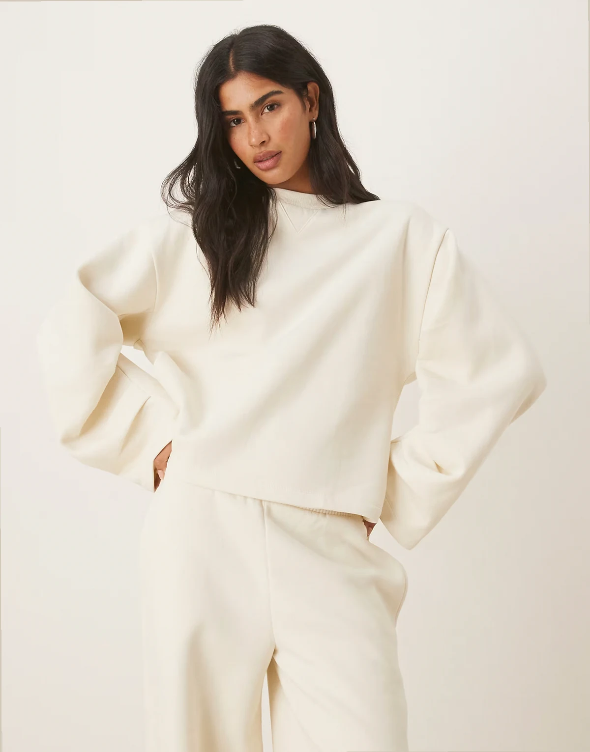 oversized brushback sweatshirt with ruched sleeve detailing in cream