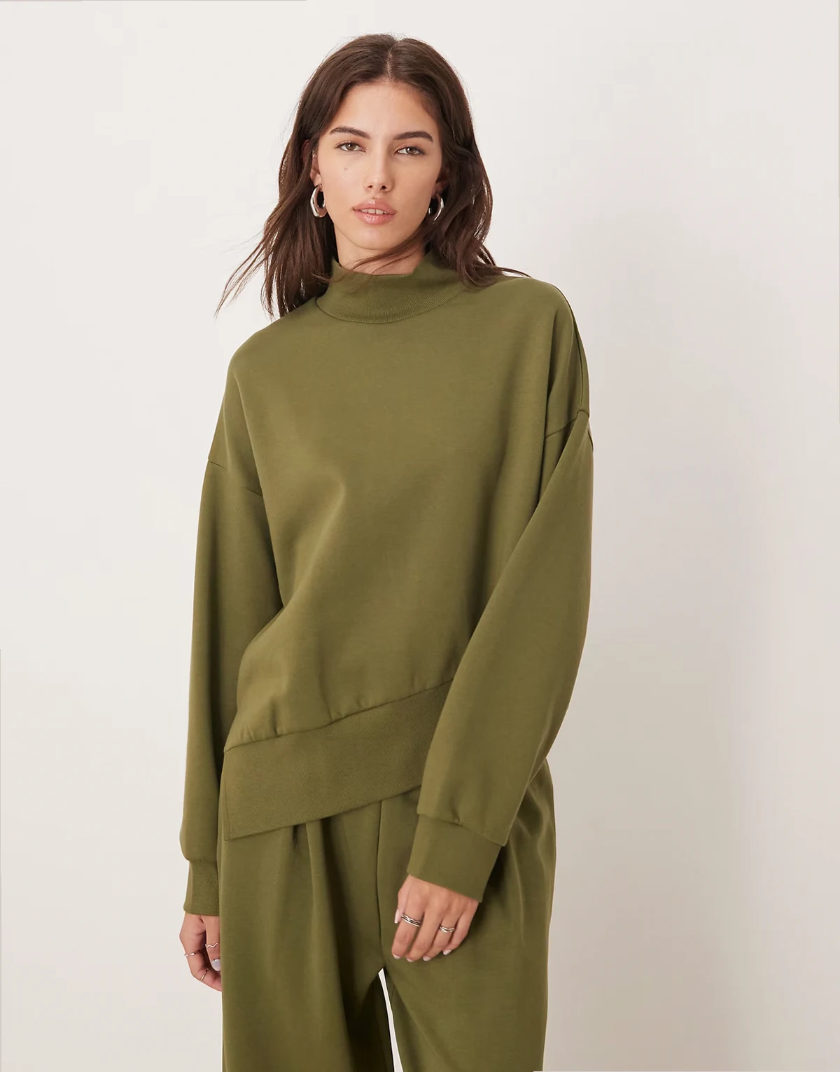 interlock funnel neck sweatshirt with asymmetric hem in khaki green