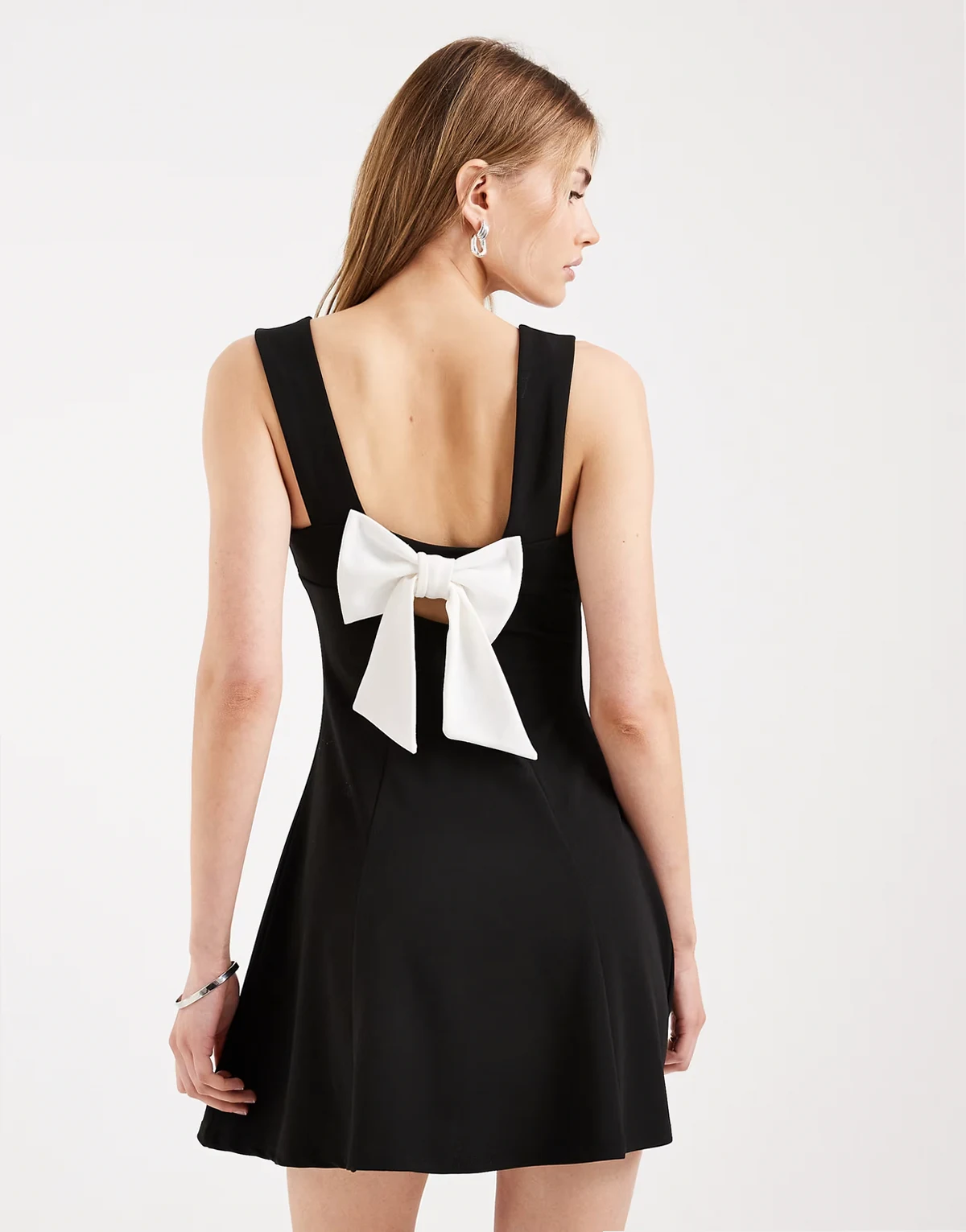 bow back mini dress in black