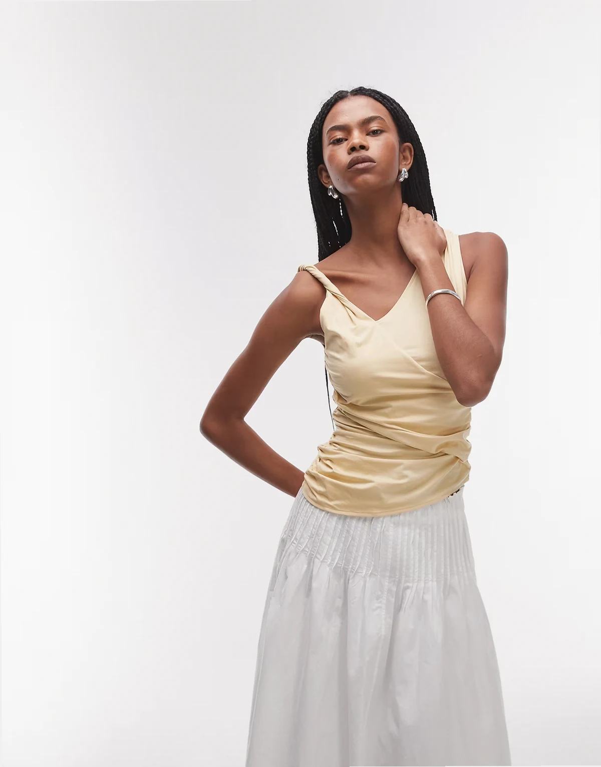 jersey top with twist and drape detail in light yellow