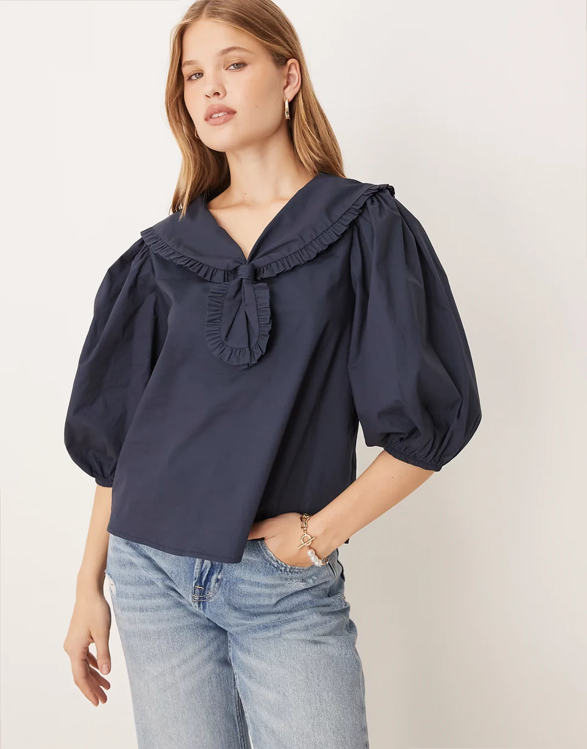 puff sleeve ruffle collar and tie blouse in navy