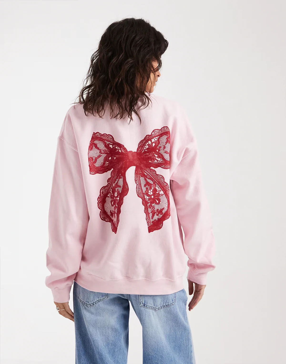 sweatshirt with lace bow graphic in pink