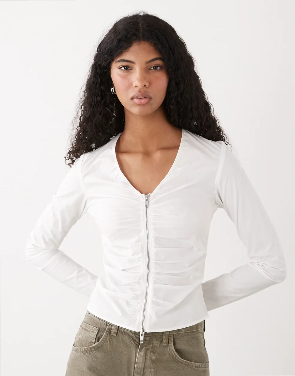 long sleeve zip front blouse with gathered detailing in white