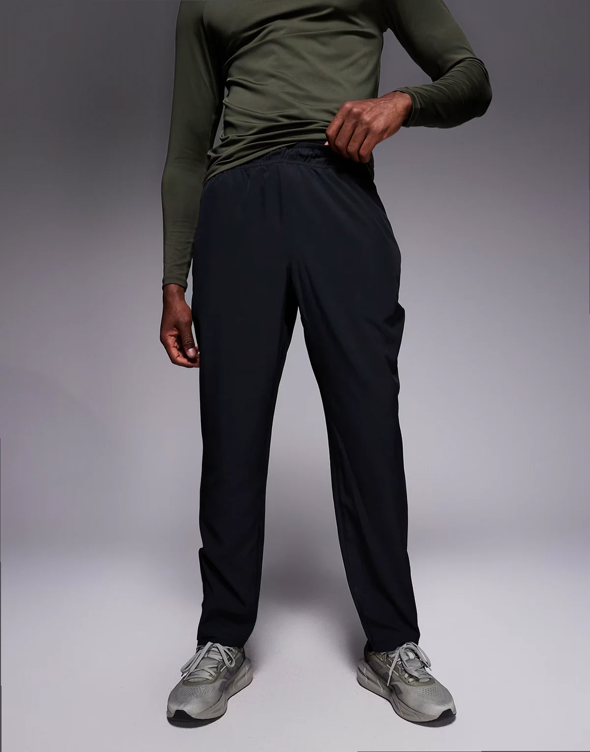 woven warm up track sweatpants with zip pockets and adjustable hem in black