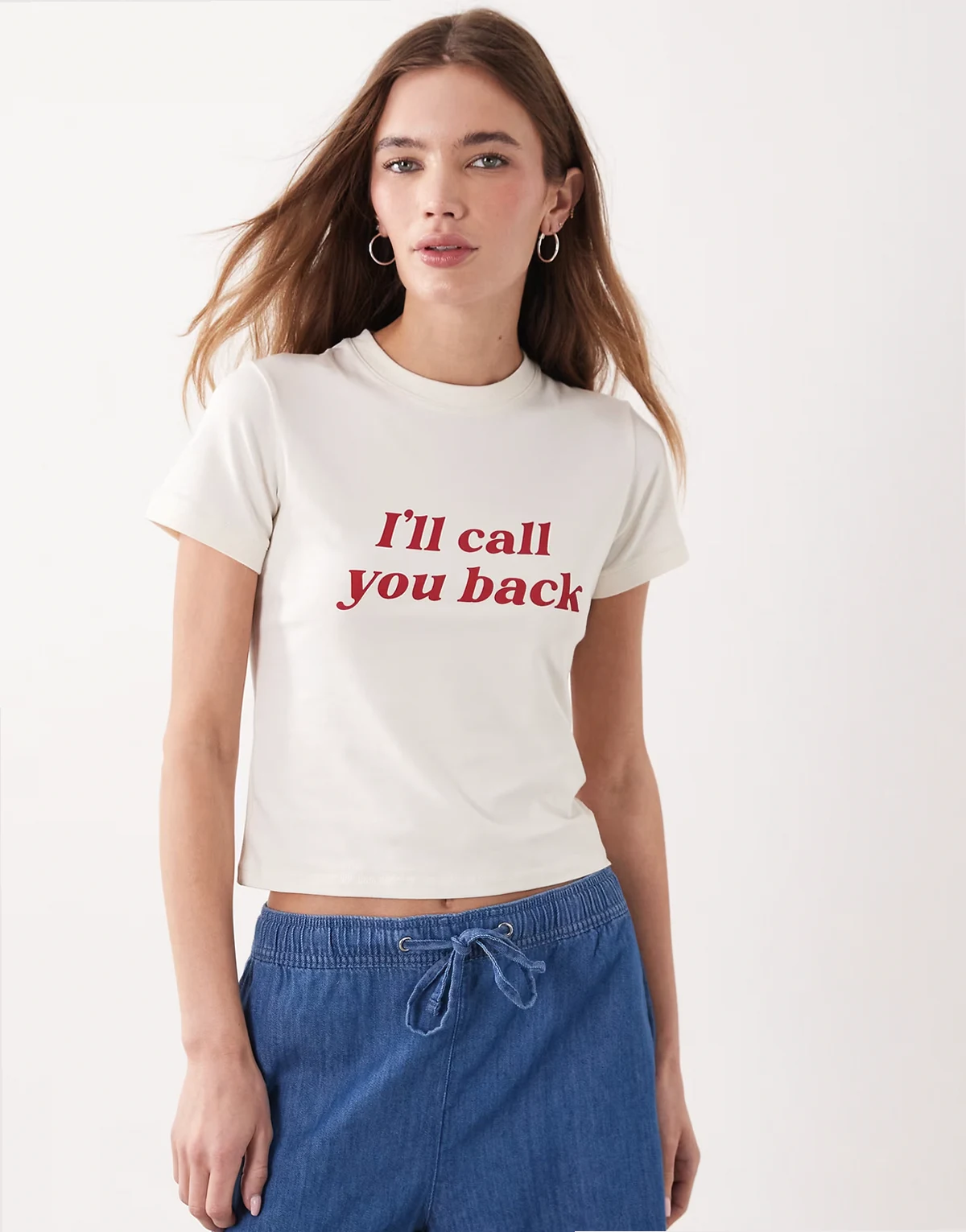 exclusive cotton blend 'I'll call you back' slogan baby tee in cream