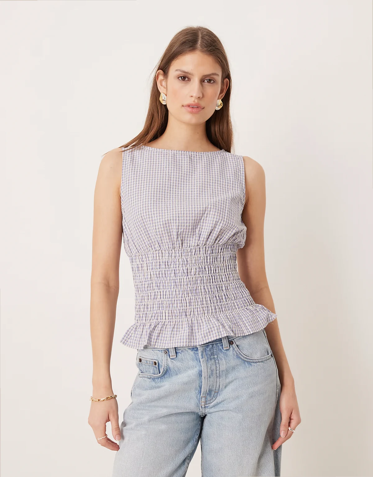 shirred waist top with ruffle hem in blue plaid