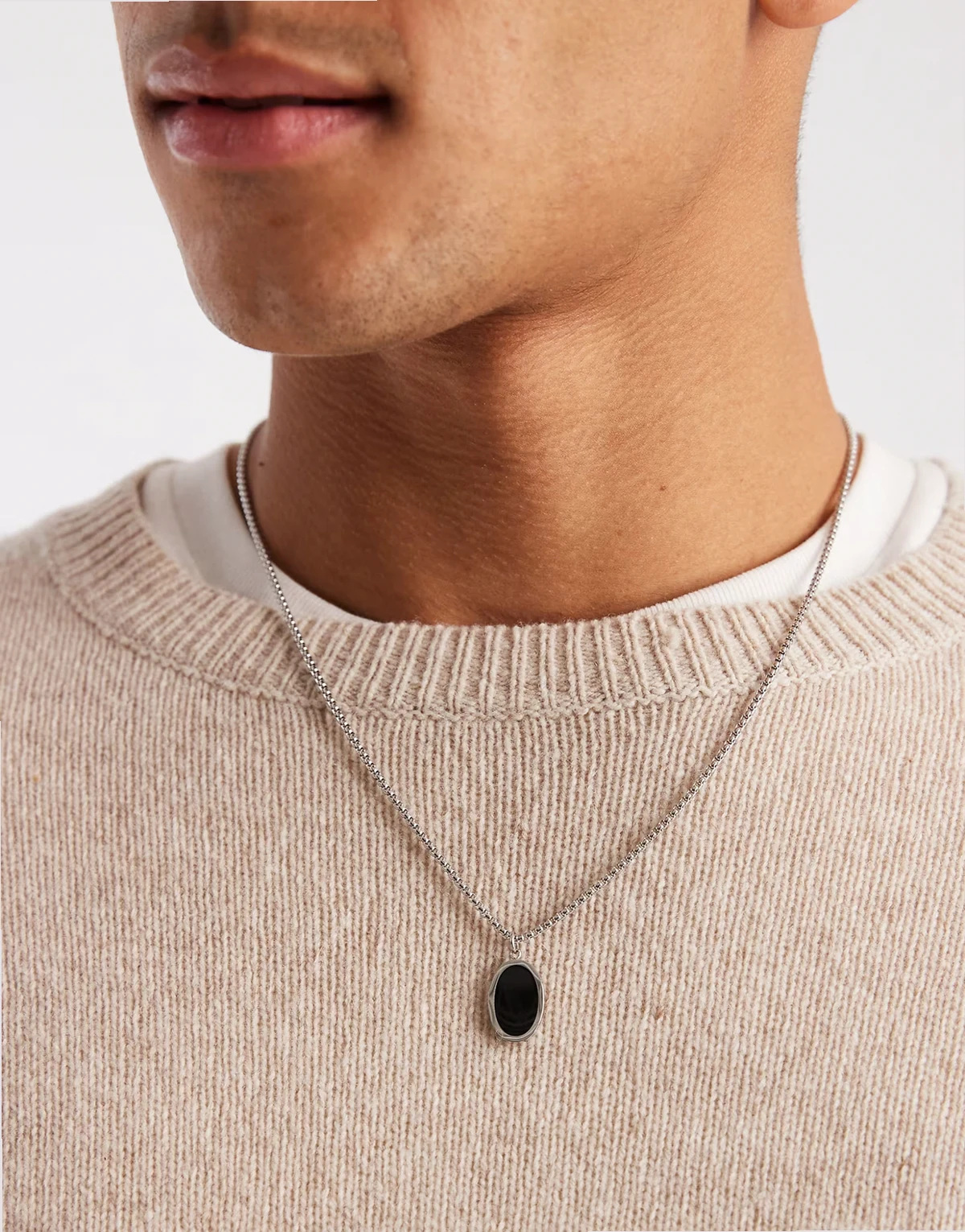 black oval pendant necklace in stainless steel