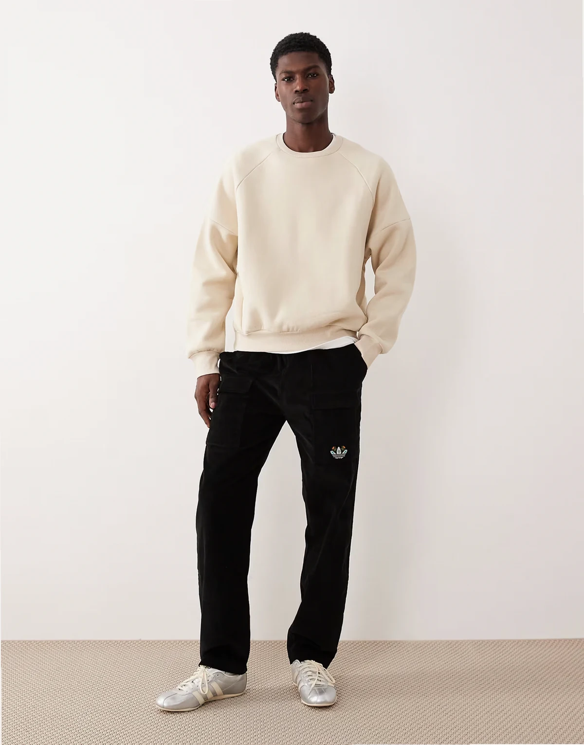 Trefoil graphic sweatpants in black