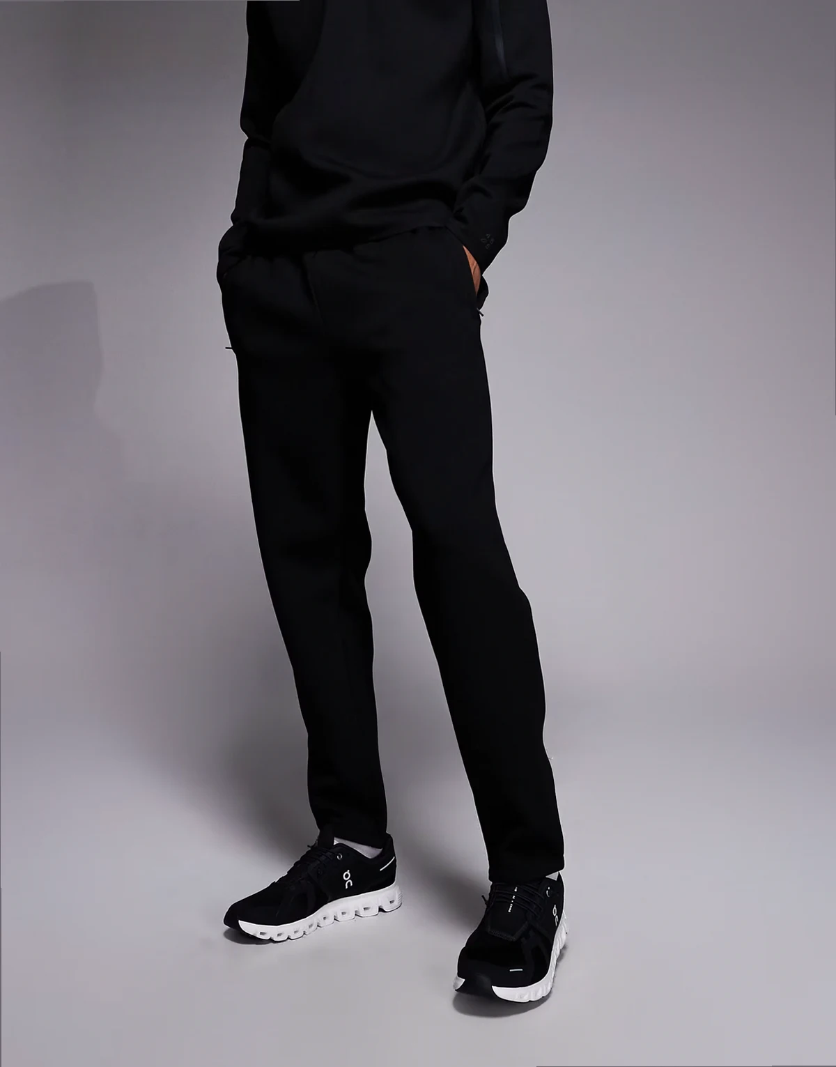 scuba-style fabric tapered sweatpants with zip pockets in black
