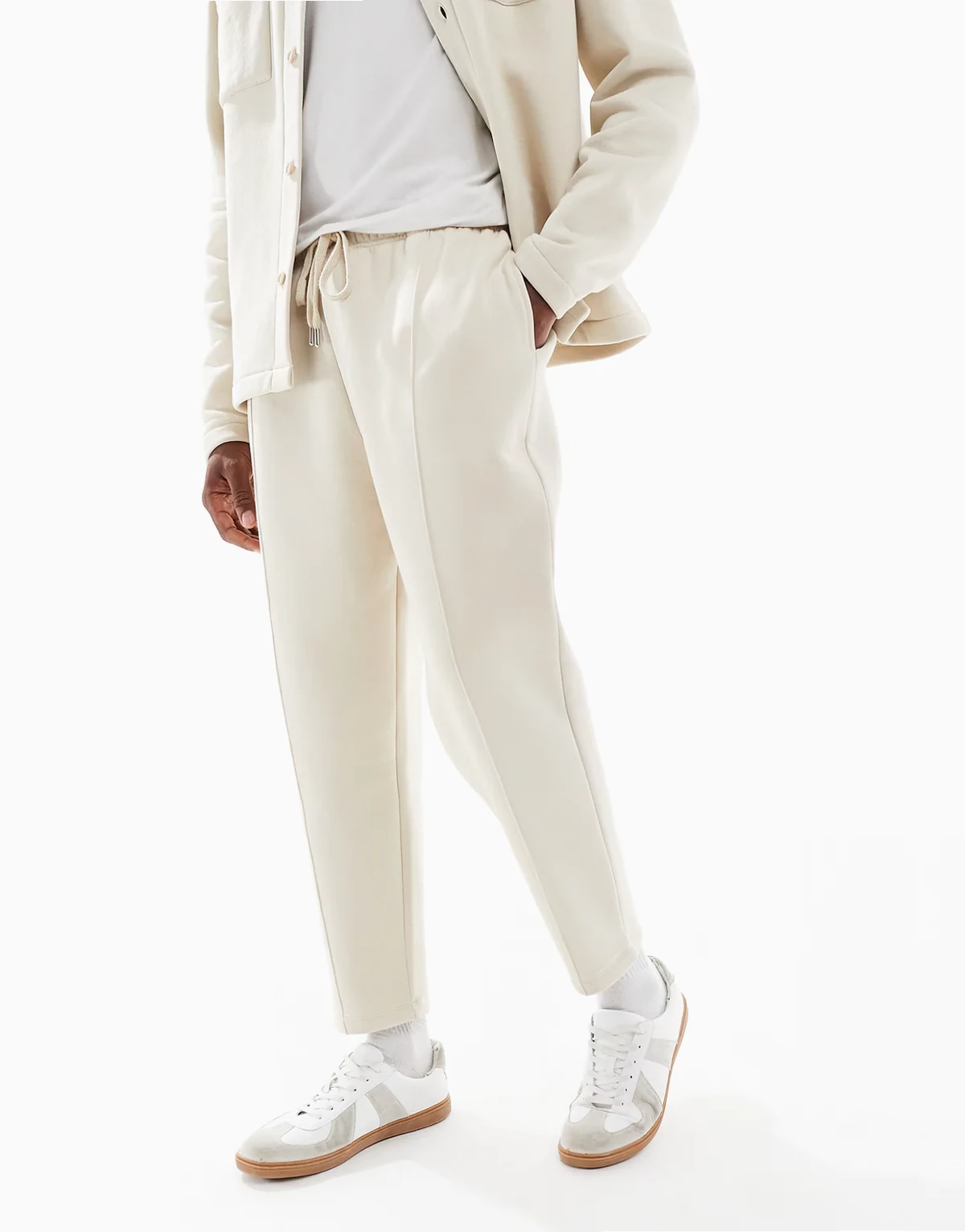 tapered fit fixed hem sweatpants with pleats in stone