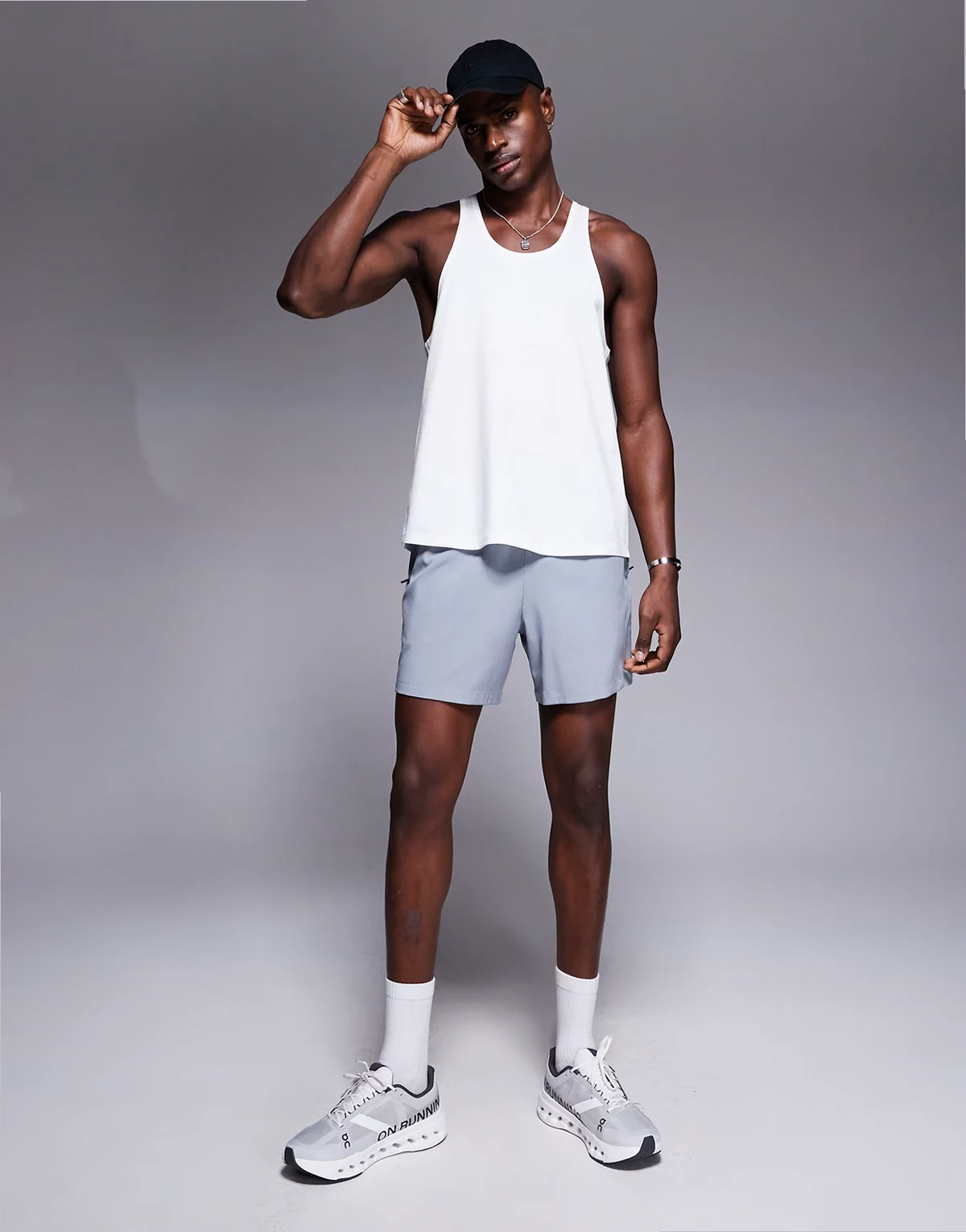 performance quick dry stringer tank top in white