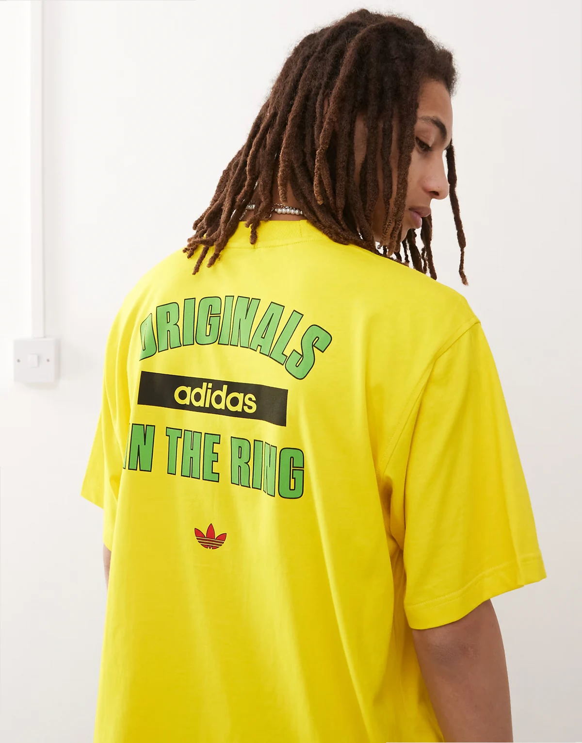unisex in the ring graphic t-shirt in yellow