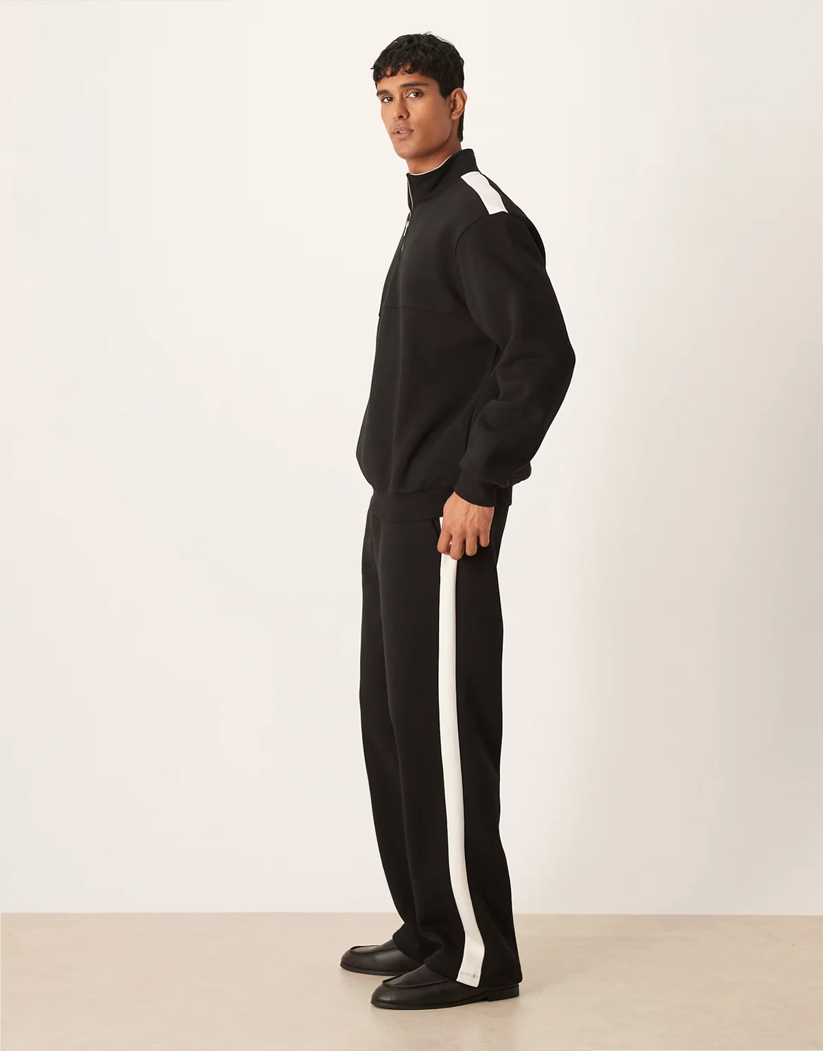 wide leg sweatpants with cut and sew panel in black - part of a set
