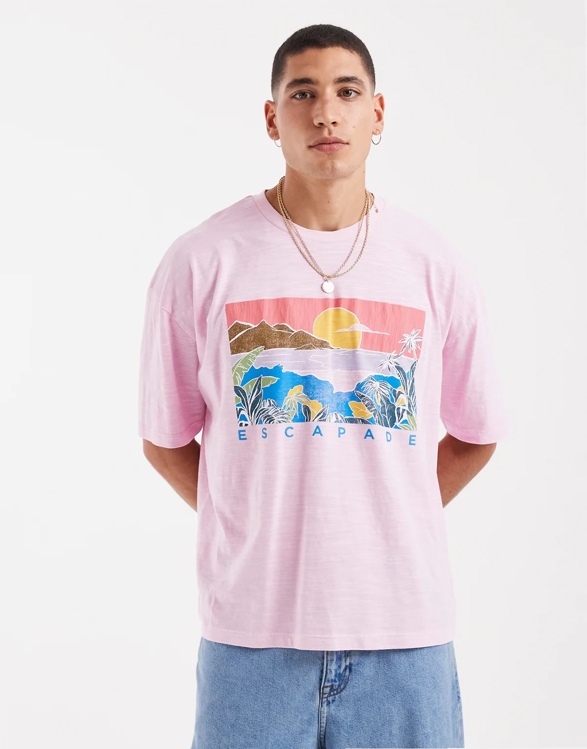– Teksturowany T-shirt oversize o pudełkowym kroju w spranym różowym kolorze z letnią grafiką