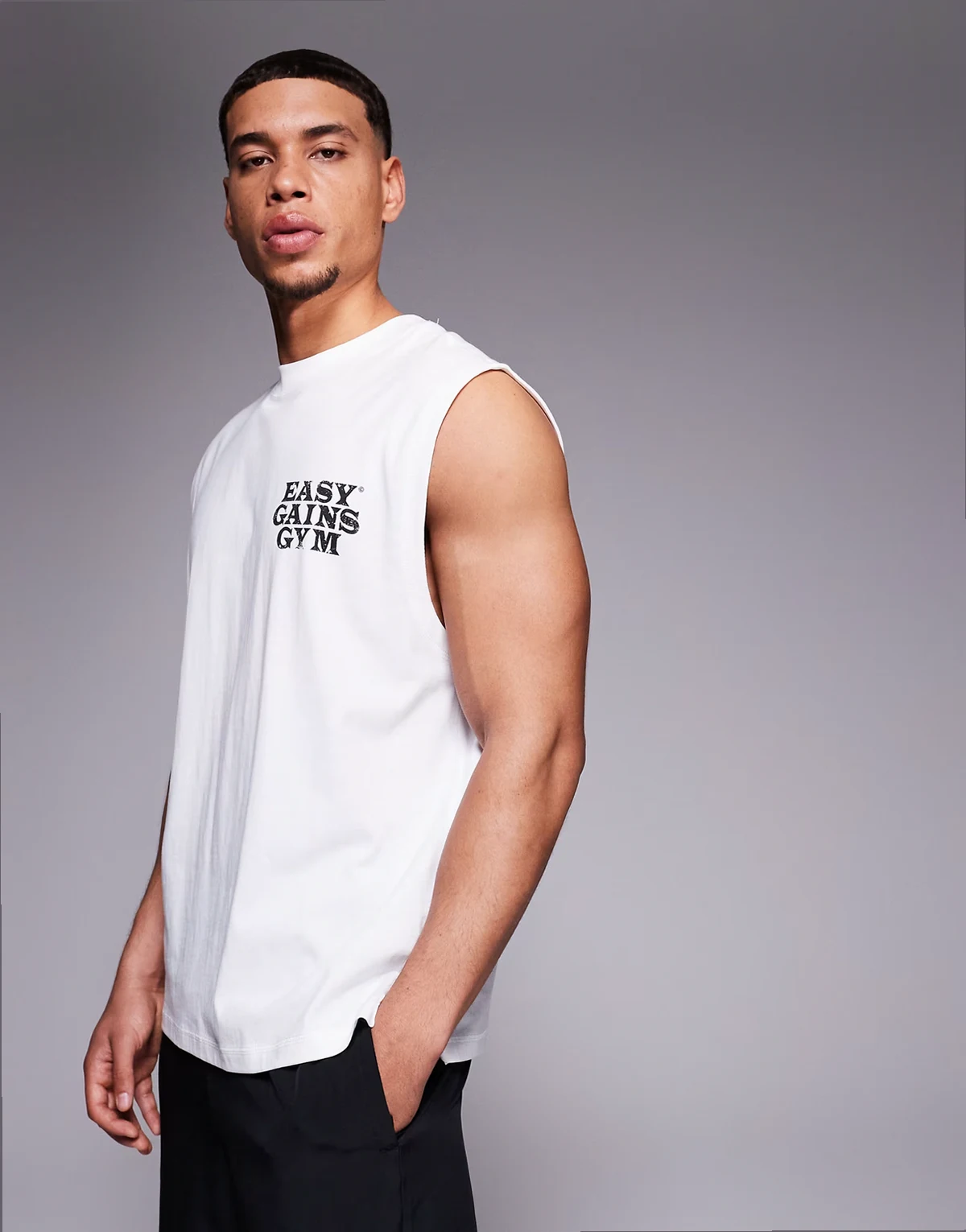 cotton oversized pump training tank top with chest graphic and quick dry finish in white