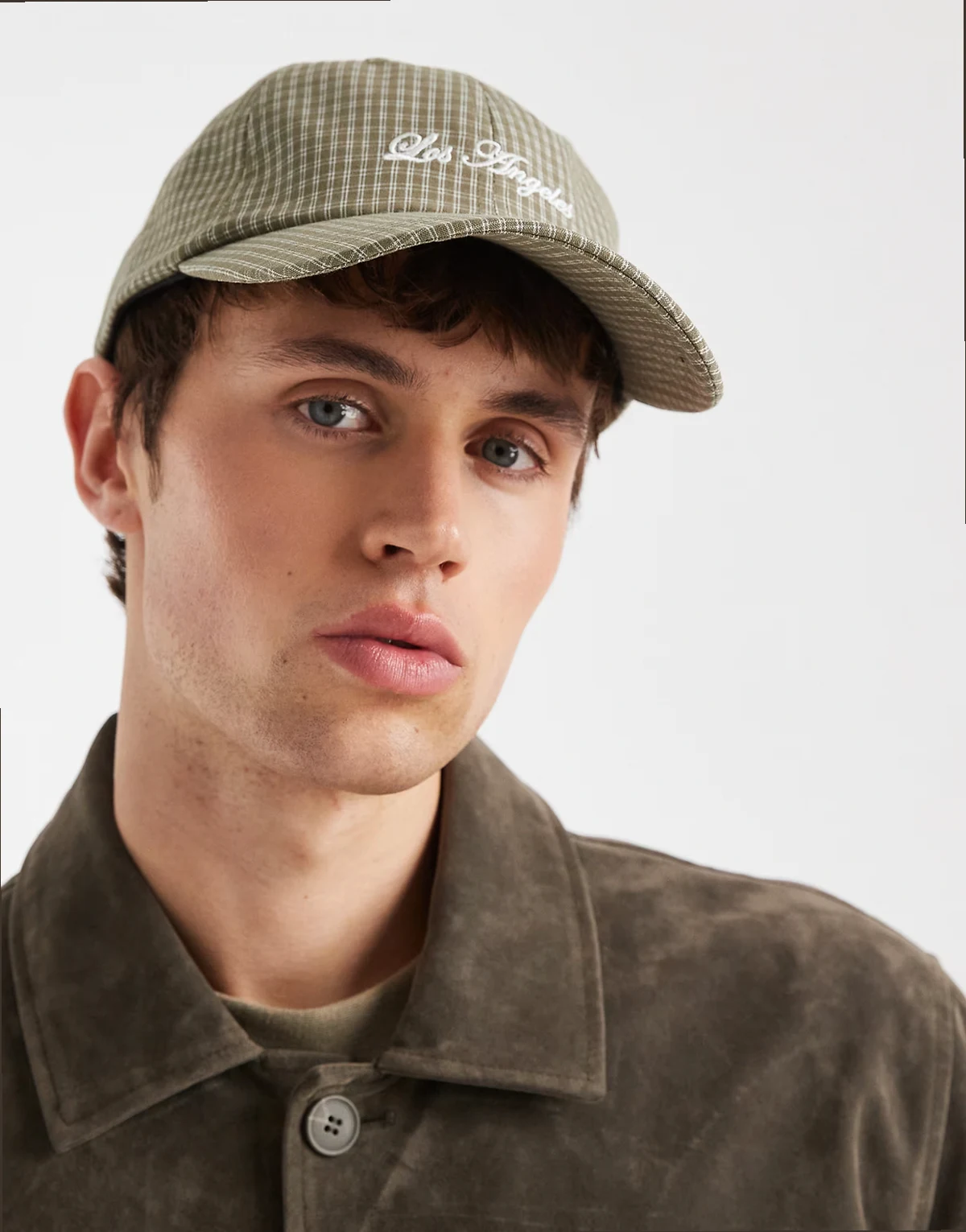 – Karierte Kappe in Grün mit Stickerei