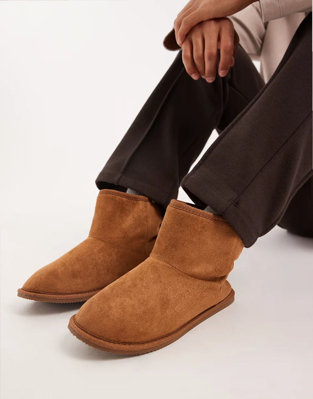 slipper boots in tan with faux fur lining