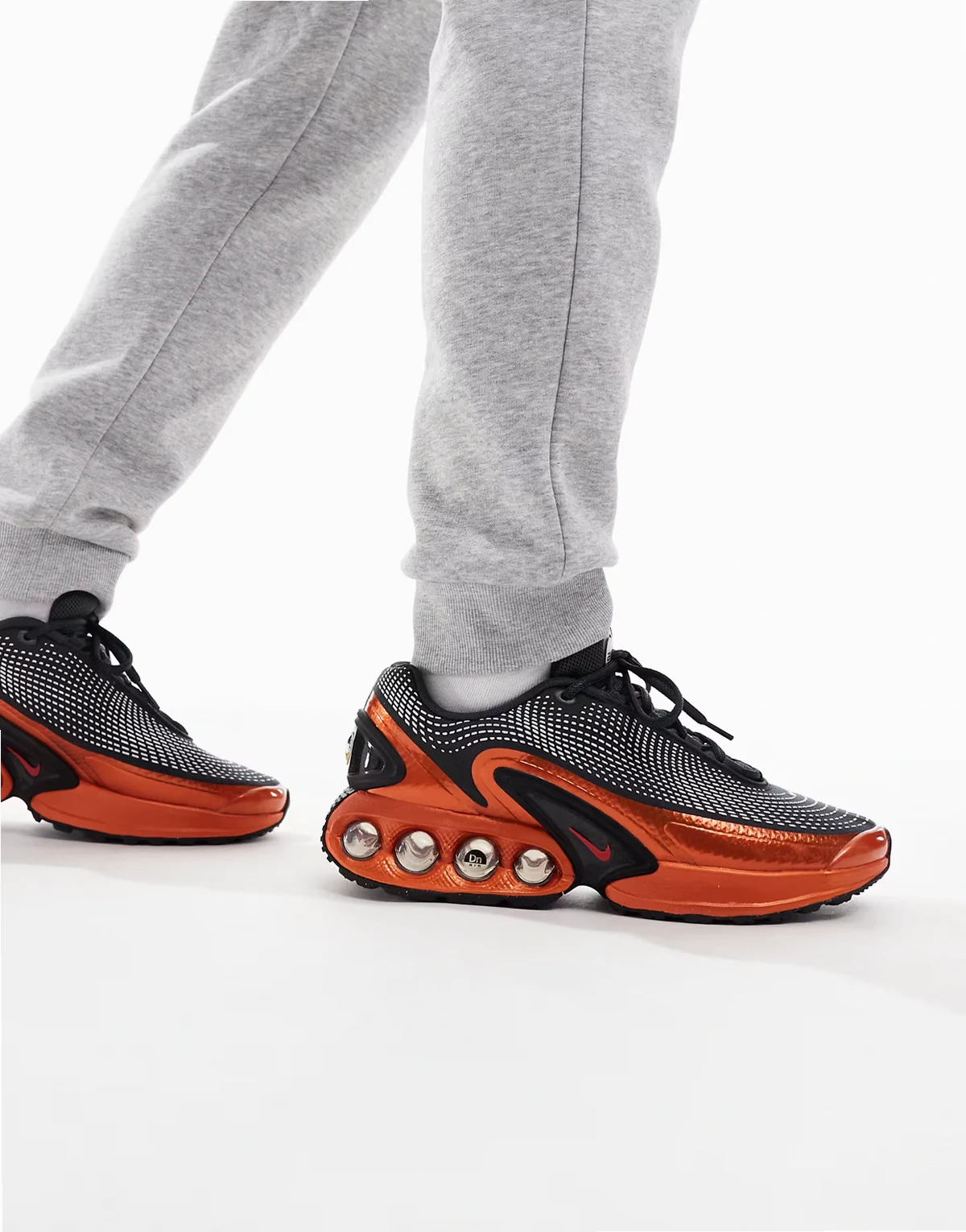 Air Max DN sneakers in dark gray and red