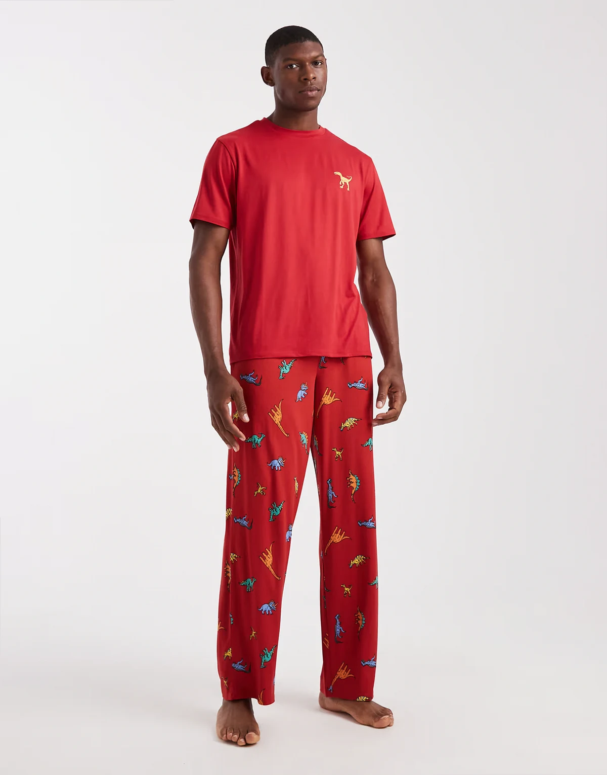 T-shirt and pants pajama set in red dinosaur print