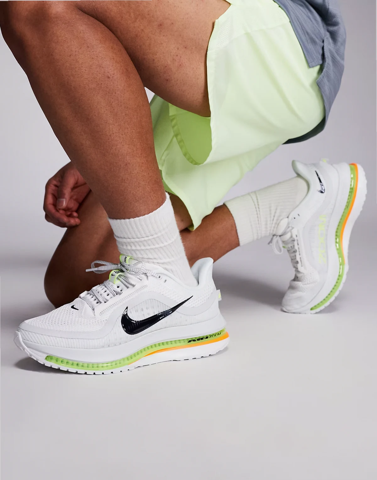 Nike Pegasus Premium sneakers in white and neon green