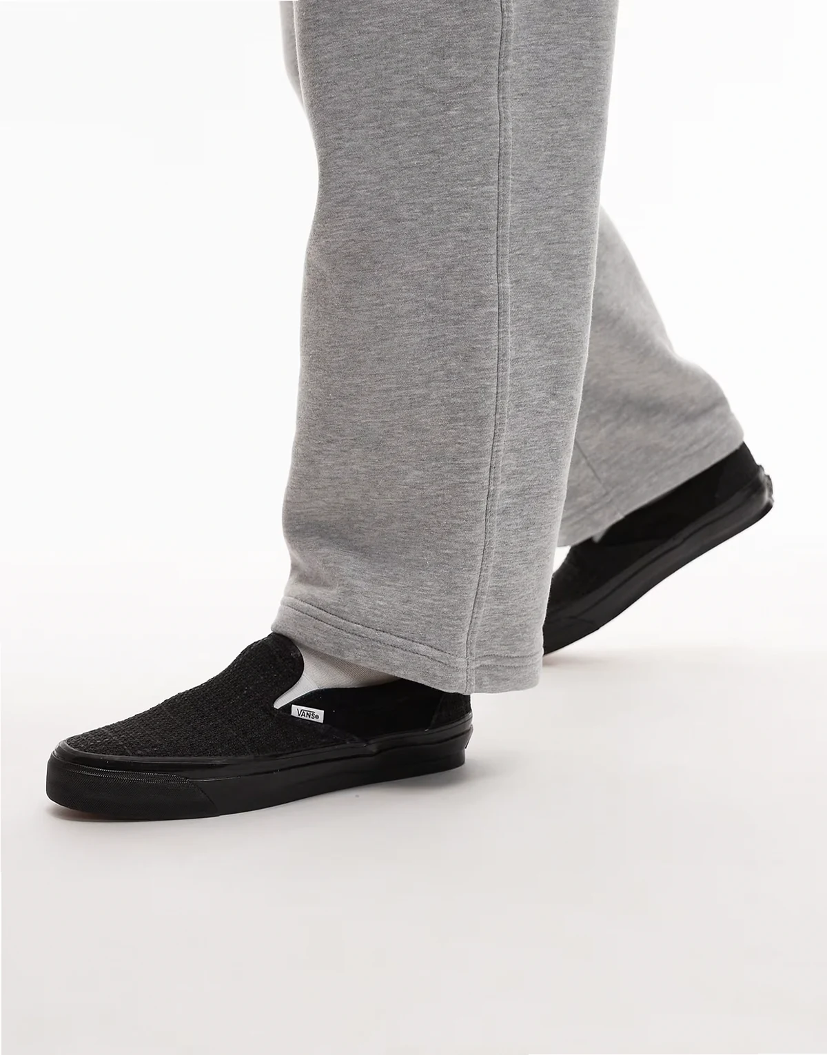 Classic LX houndstooth slip on sneakers in black and white