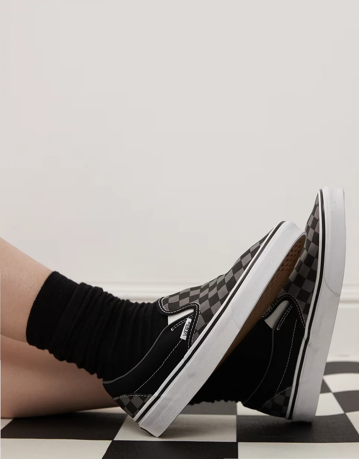 Classic slip on checkerboard sneakers in black