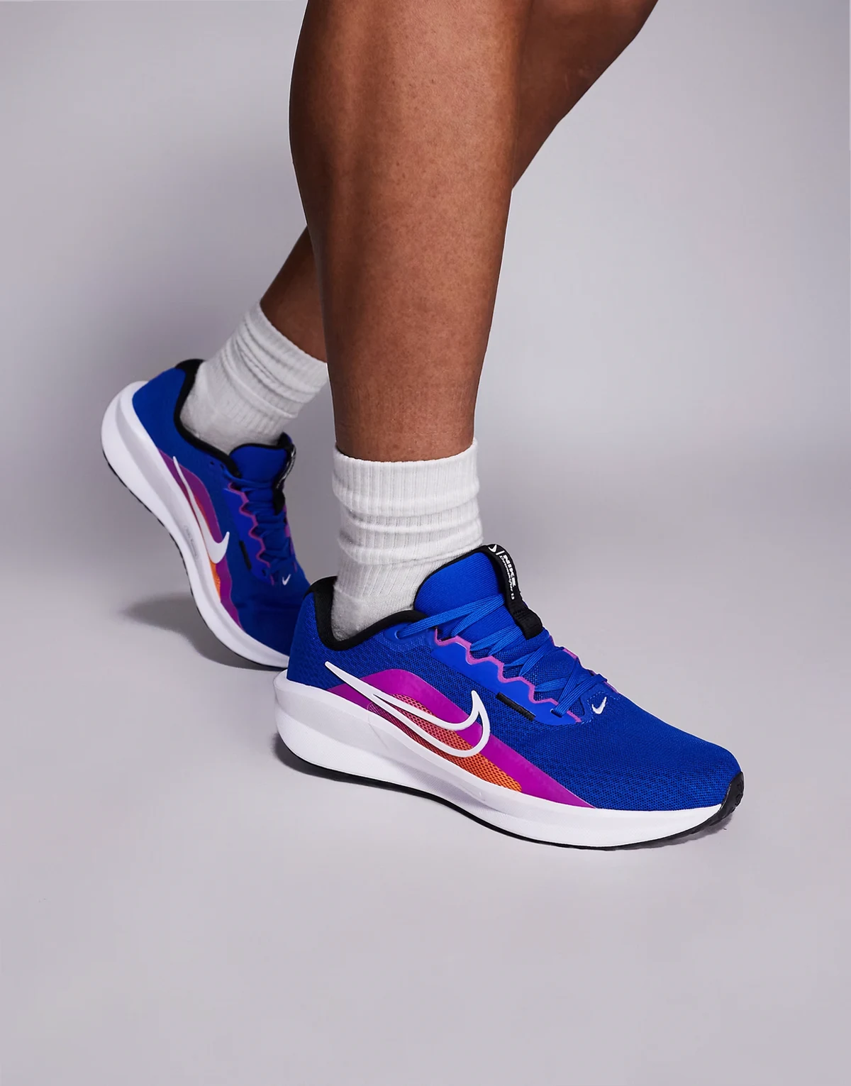Nike Downshifter 13 running sneakers in blue and white