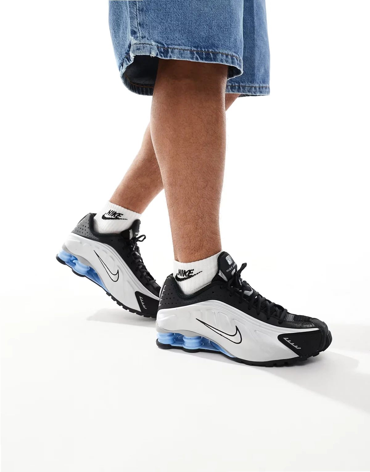 Shox R4 sneakers in black and silver