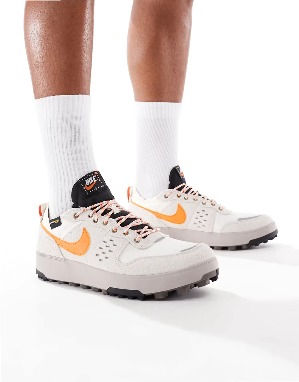 C1TY sneakers in off-white and orange