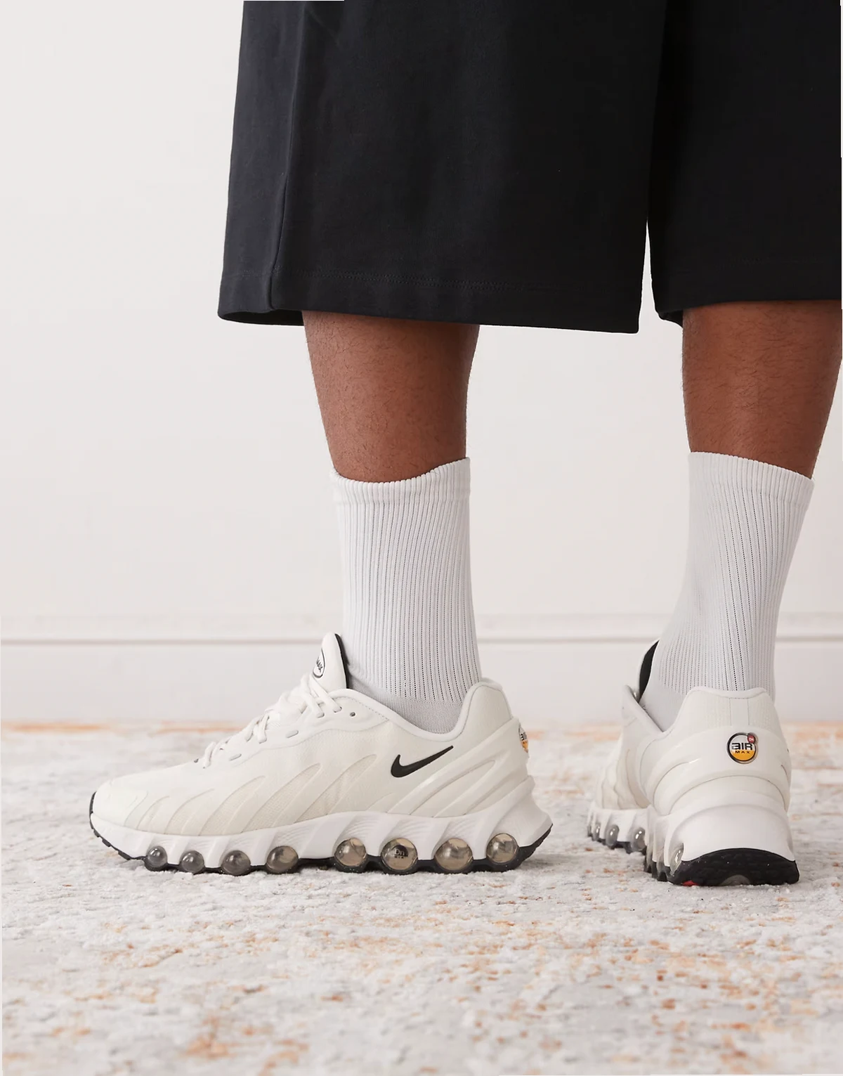 Air Max DN8 sneakers in off white and black
