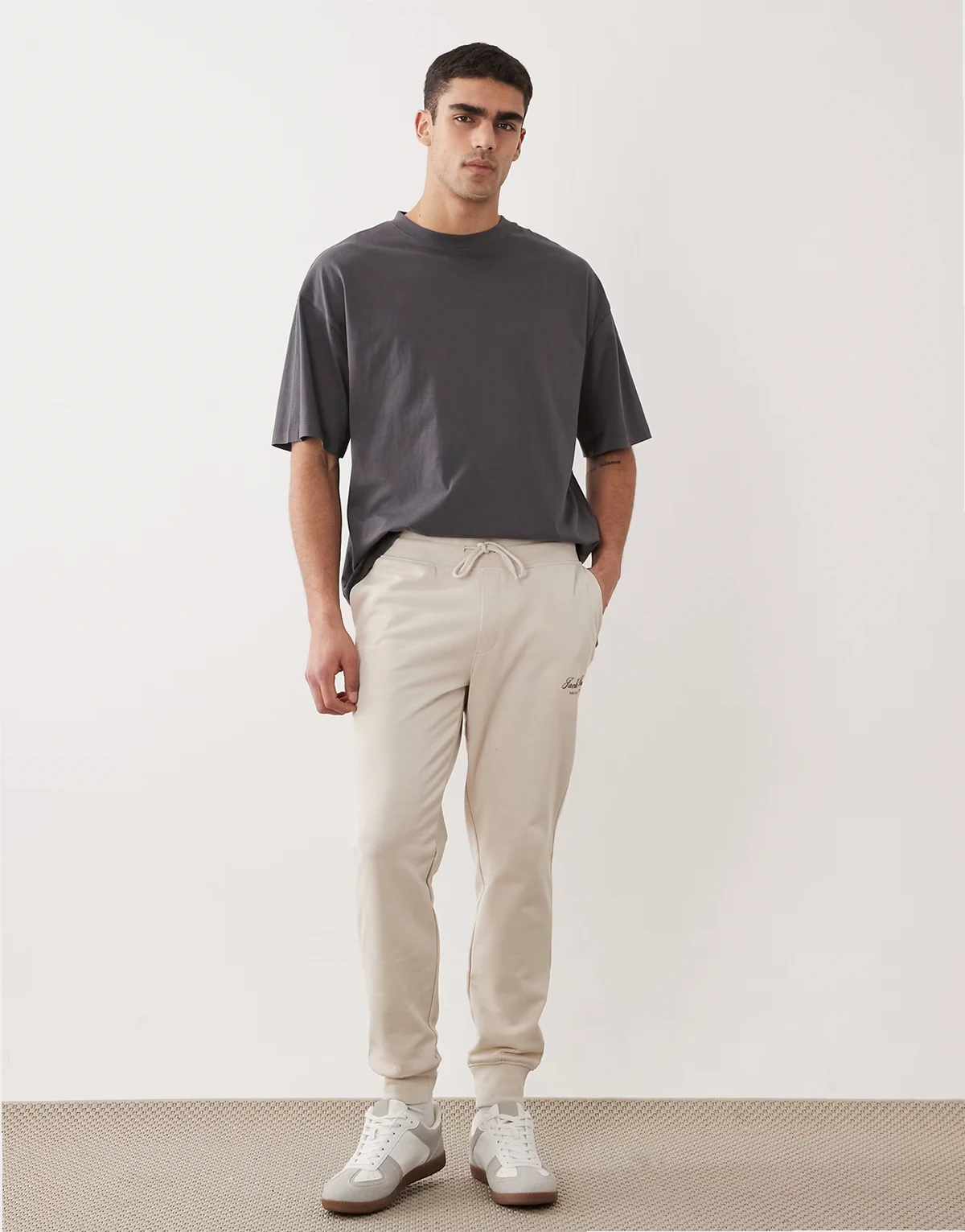 straight fit cuffed sweatpants with logo in beige