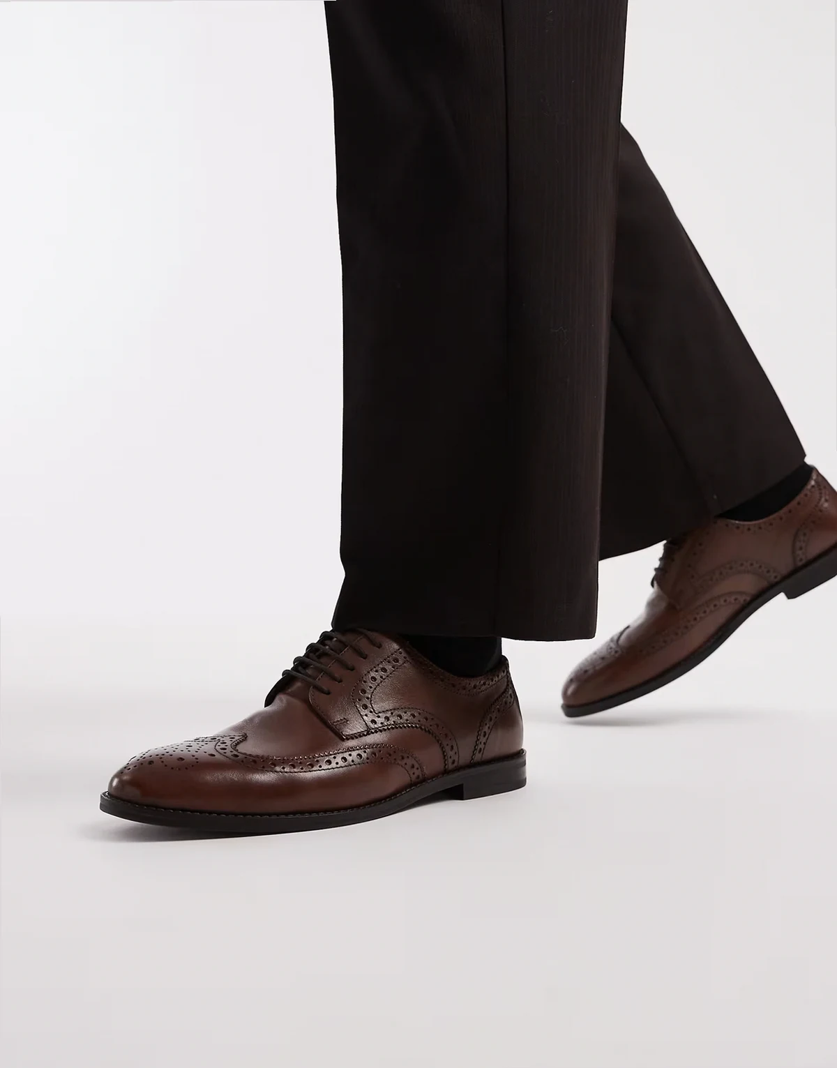 lace up brogue boots in brown leather