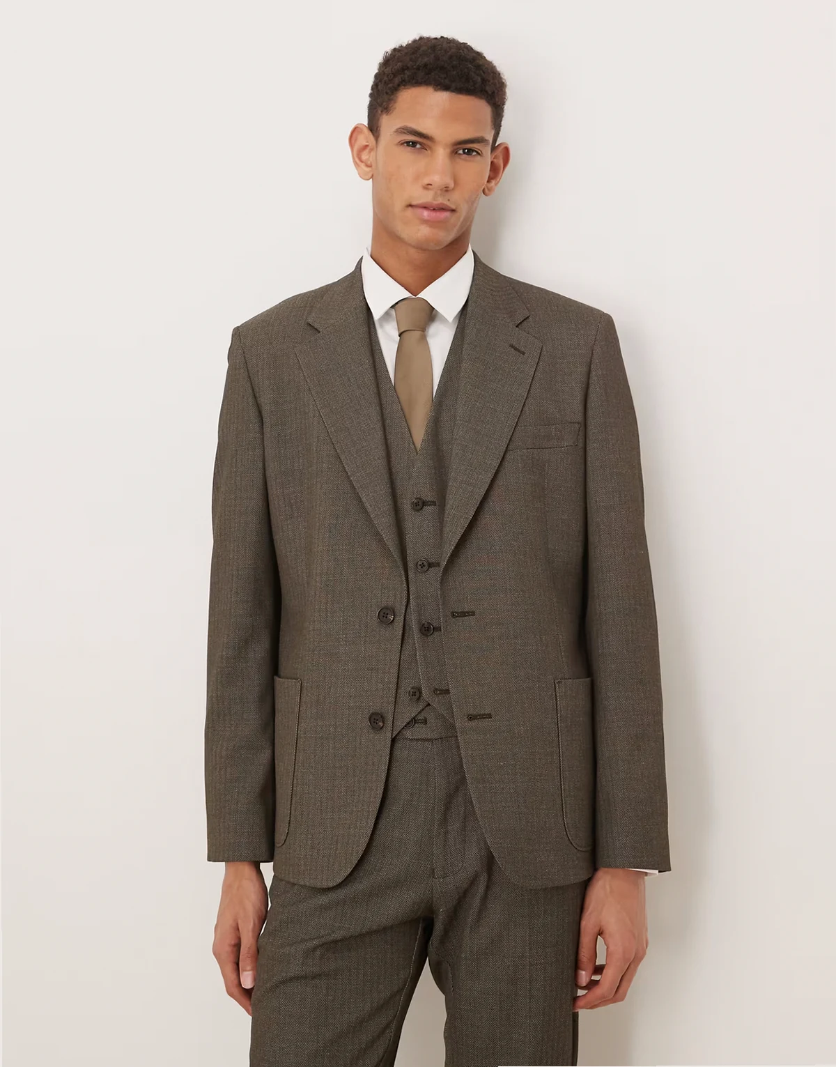 – Anzugjacke in dunkelgrüner Wolloptik mit engem Schnitt und Fischgrätmuster