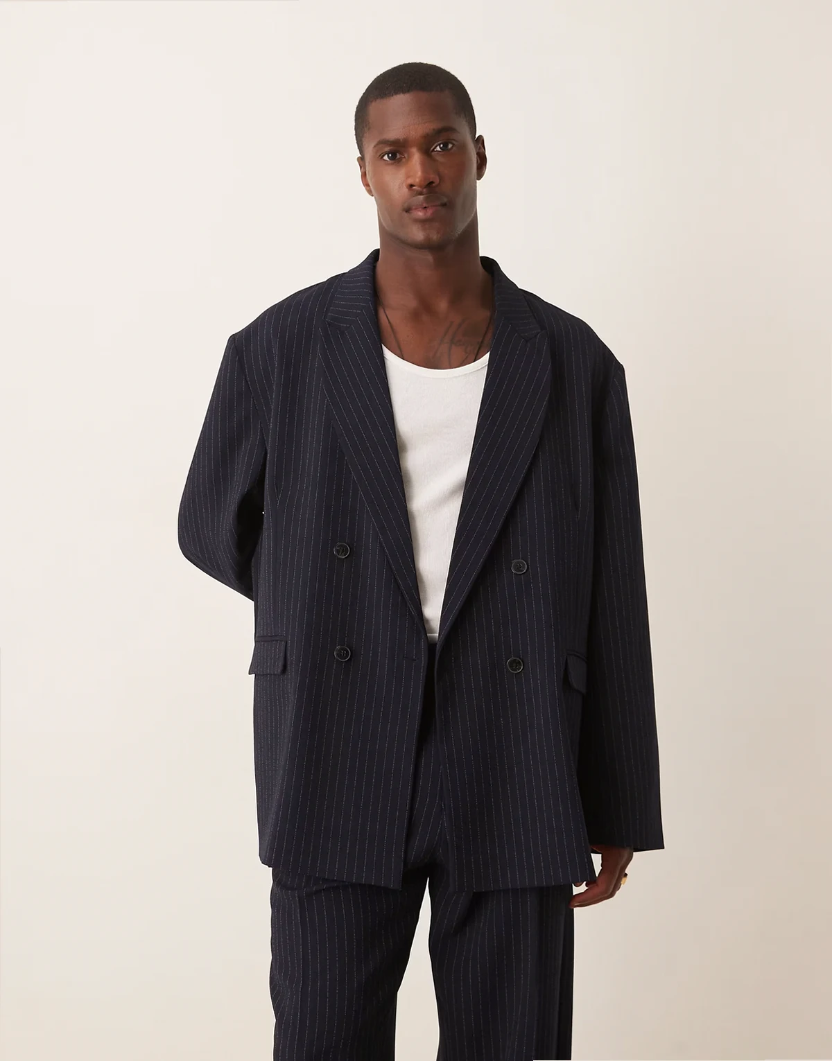 slouchy oversized suit jacket in navy pinstripes