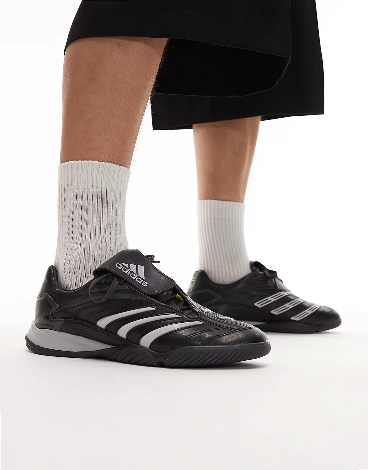 Predator Sala sneakers in black and white