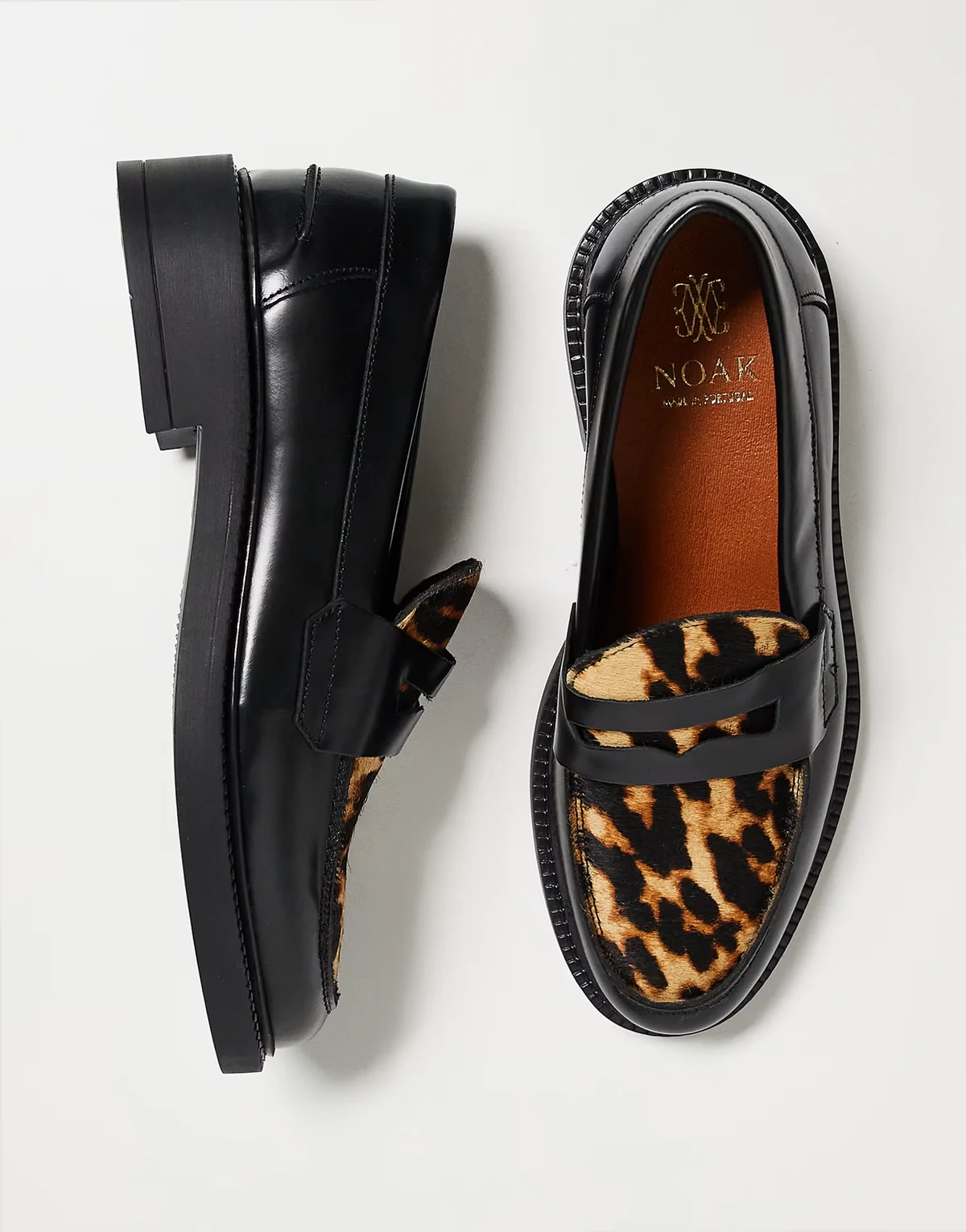 made in Portugal penny loafers in black leather with cow hair vamp in leopard print