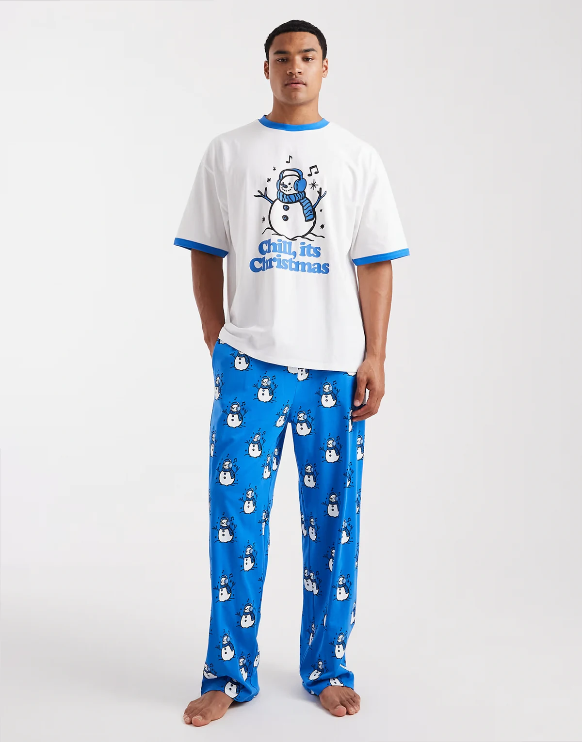 Christmas pajama set with snowman graphic in blue