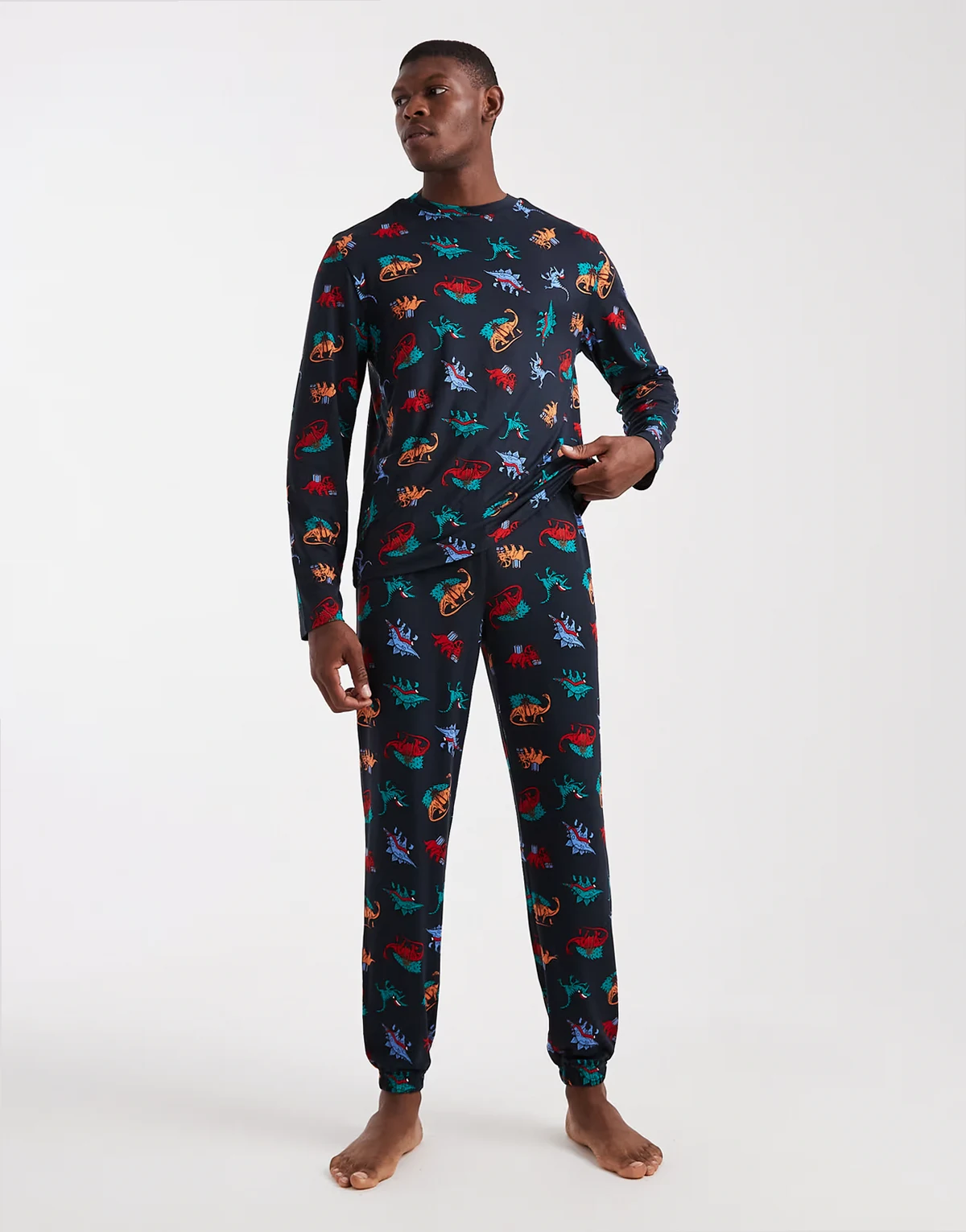 Christmas long sleeve crew and pajama bottoms in navy dinosaur print