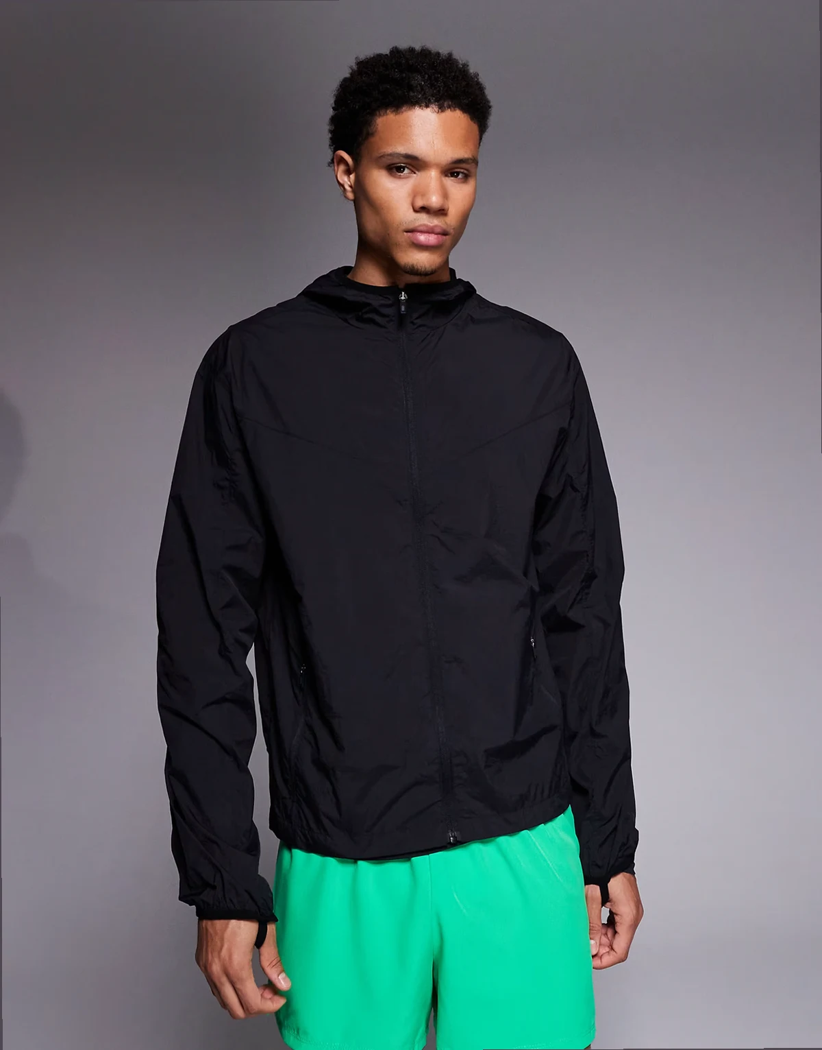 crinkle nylon water repellent lightweight boxy fit run jacket with hood in black